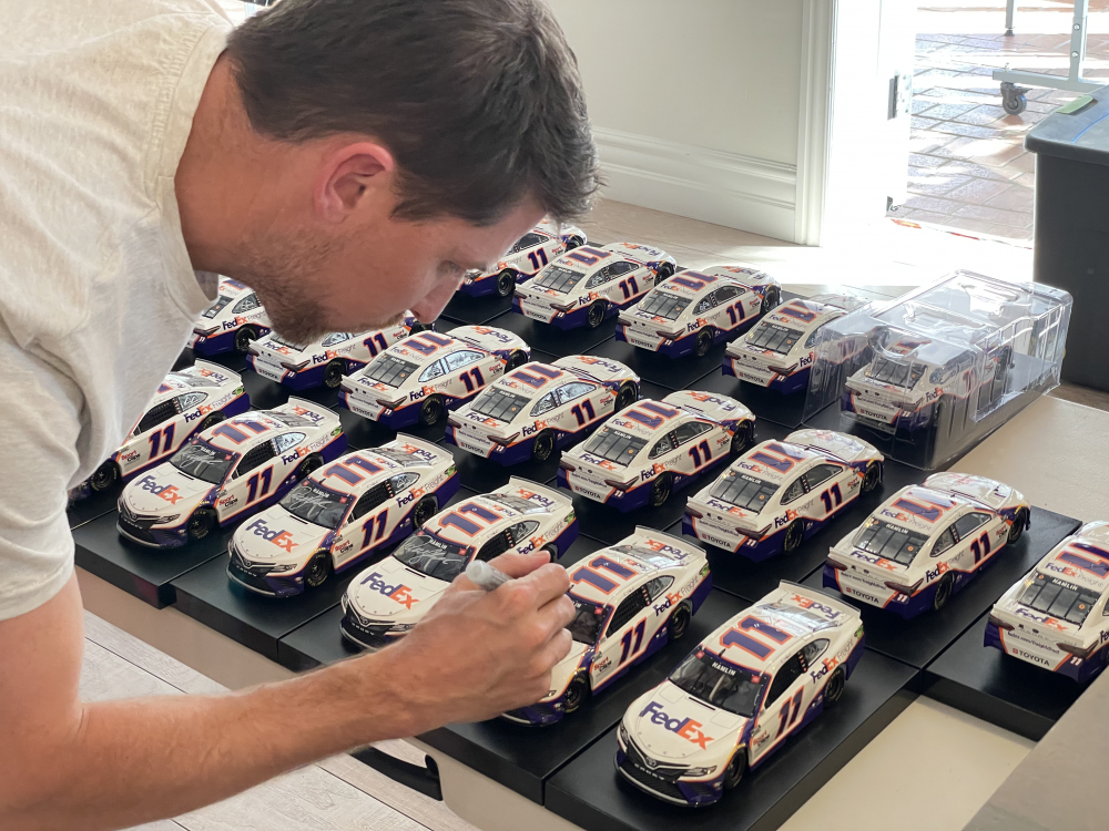 Denny Hamlin Signed 2020 NASCAR #11 FedEx Delivering Strength - Darlington Win - Raced Version - 1:24 Premium Action Diecast Car (PA) at PristineAuction.com Denny Hamlin Signed 2020 NASCAR #11 FedEx Delivering Strength - Darlington Win - Raced Version - 1:24 Premium Action Diecast Car (PA) at PristineAuction.com
