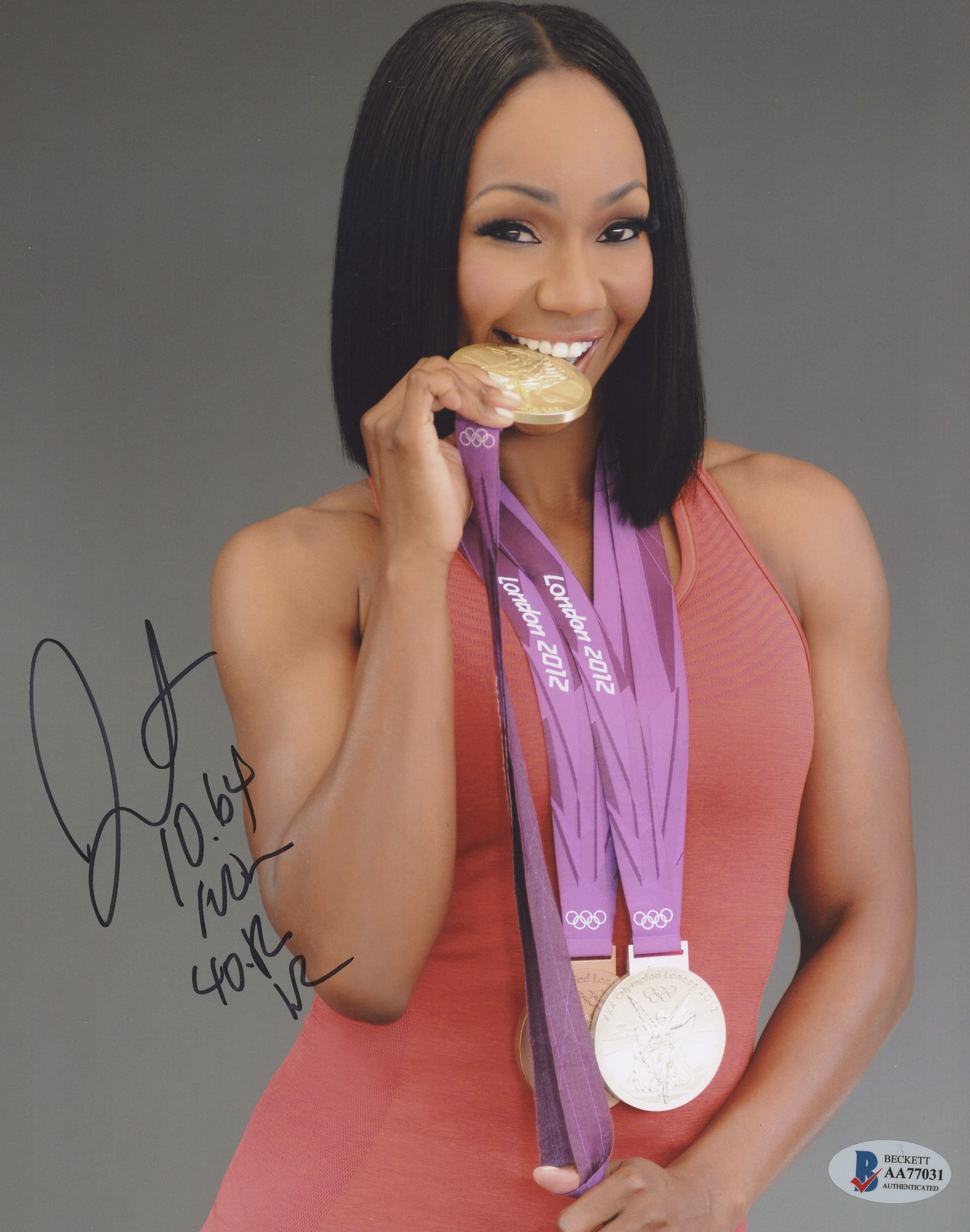 Carmelita Jeter Signed 8x10 Photo Inscribed "10.64 WR" & "40.82 WR" (Beckett COA) at PristineAuction.com Carmelita Jeter Signed 8x10 Photo Inscribed "10.64 WR" & "40.82 WR" (Beckett COA) at PristineAuction.com