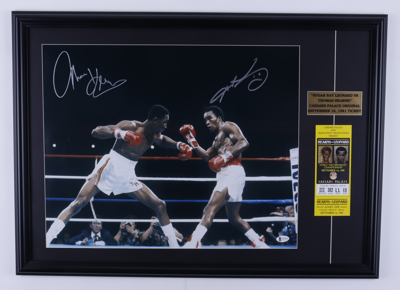 Sugar Ray Leonard & Thomas Hearns Signed 20x28 Custom Framed Photo Display with Original Caesar's Palace Fight Ticket (Beckett Hologram) at PristineAuction.com Sugar Ray Leonard & Thomas Hearns Signed 20x28 Custom Framed Photo Display with Original Caesar's Palace Fight Ticket (Beckett Hologram) at PristineAuction.com