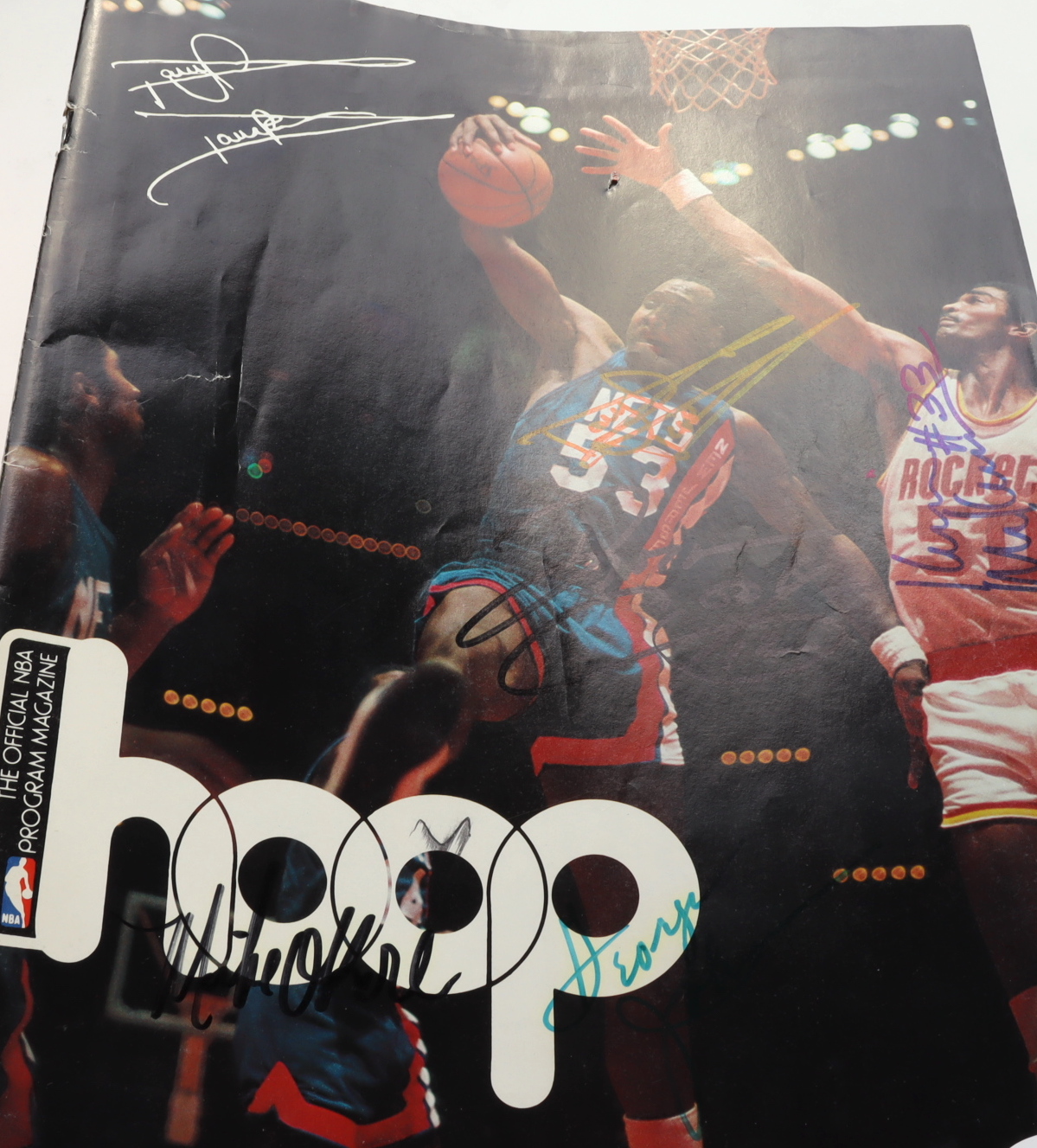 1984-85 Hoops: The Official NBA Program Magazine Signed By (5) with Darryl Dawkins, George Johnson, Mike O'Koren, Darwin Cook (JSA) at PristineAuction.com 1984-85 Hoops: The Official NBA Program Magazine Signed By (5) with Darryl Dawkins, George Johnson, Mike O'Koren, Darwin Cook (JSA) at PristineAuction.com