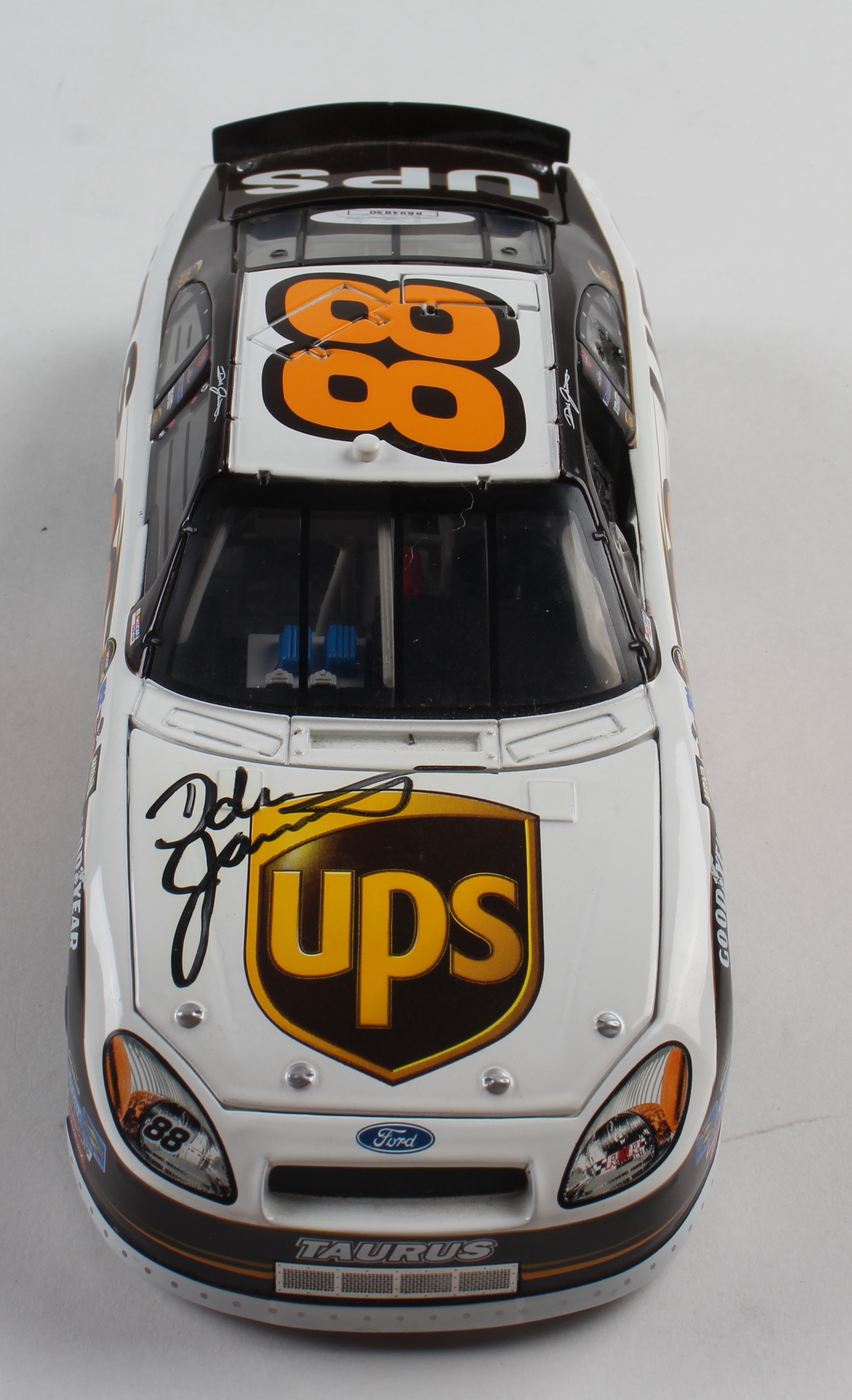 Dale Jarrett Signed LE 2005 NASCAR #88 UPS Ford Taurus - 1:24 Diecast Car (JSA COA) at PristineAuction.com Dale Jarrett Signed LE 2005 NASCAR #88 UPS Ford Taurus - 1:24 Diecast Car (JSA COA) at PristineAuction.com