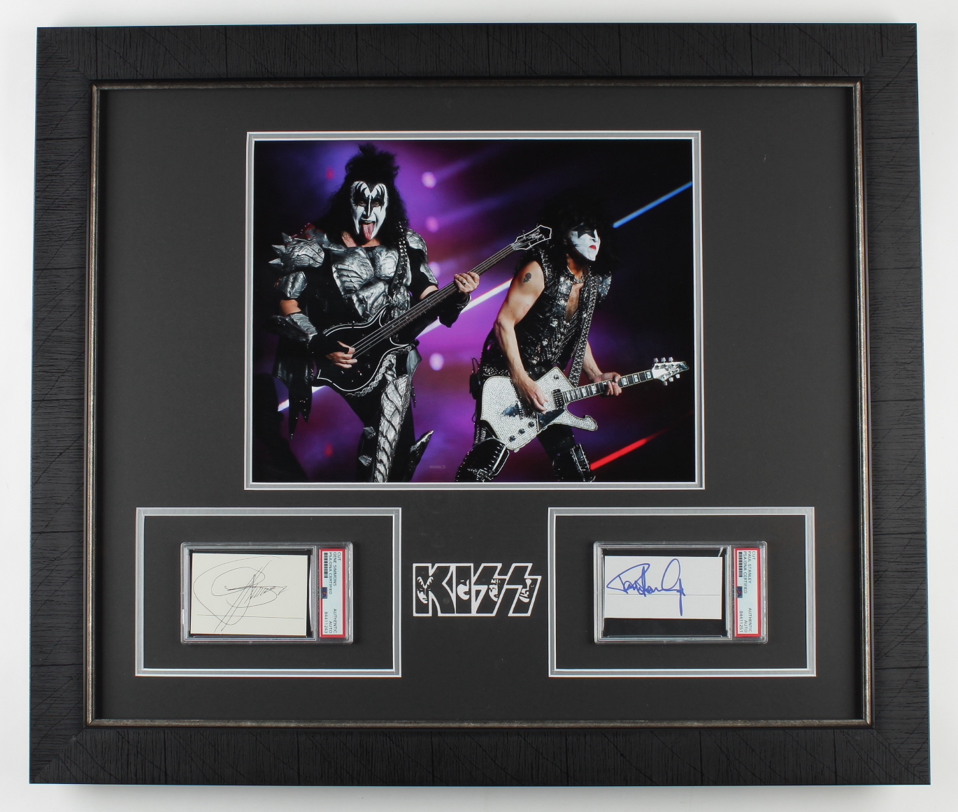 Gene Simmons & Paul Stanley Signed "KISS" 23.5x27.5 Custom Framed Cut Display (PSA Encapsulated) at PristineAuction.com Gene Simmons & Paul Stanley Signed "KISS" 23.5x27.5 Custom Framed Cut Display (PSA Encapsulated) at PristineAuction.com