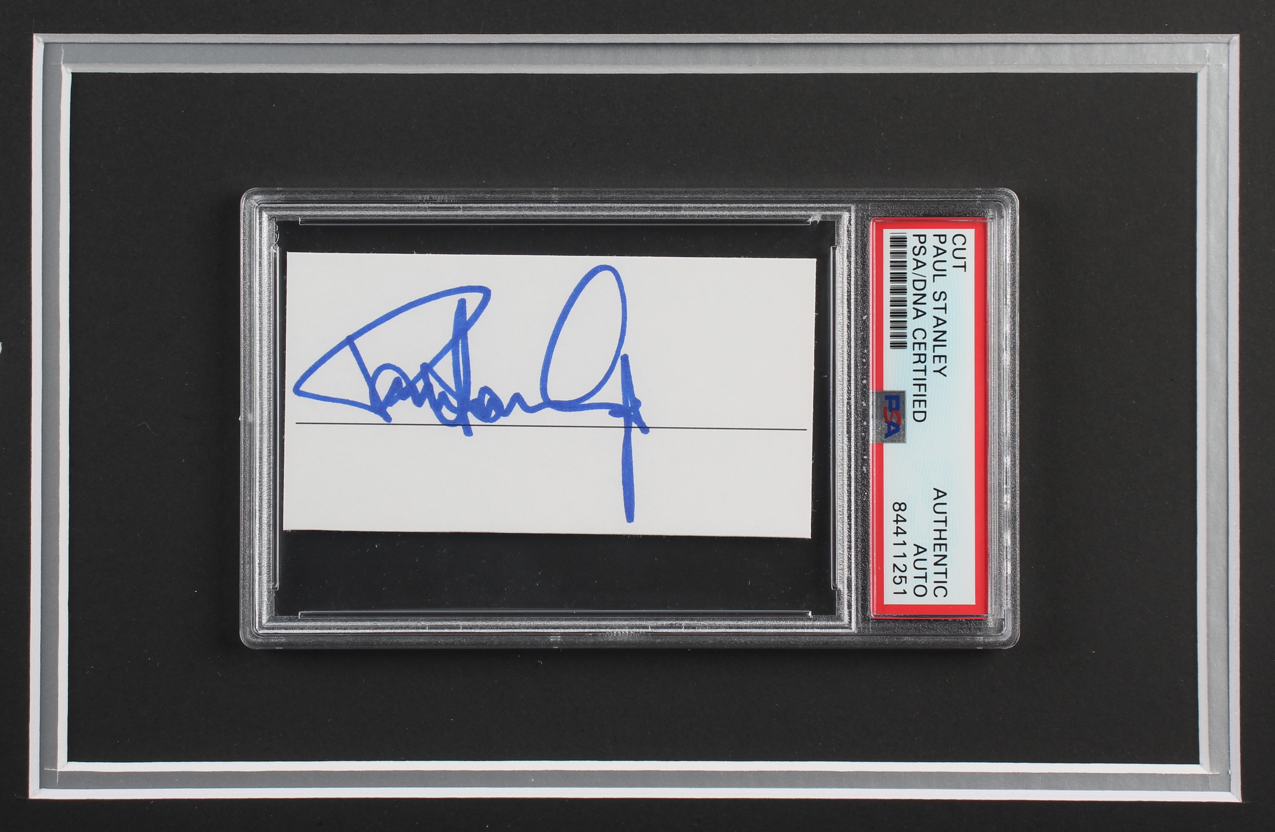 Gene Simmons & Paul Stanley Signed "KISS" 23.5x27.5 Custom Framed Cut Display (PSA Encapsulated) at PristineAuction.com Gene Simmons & Paul Stanley Signed "KISS" 23.5x27.5 Custom Framed Cut Display (PSA Encapsulated) at PristineAuction.com