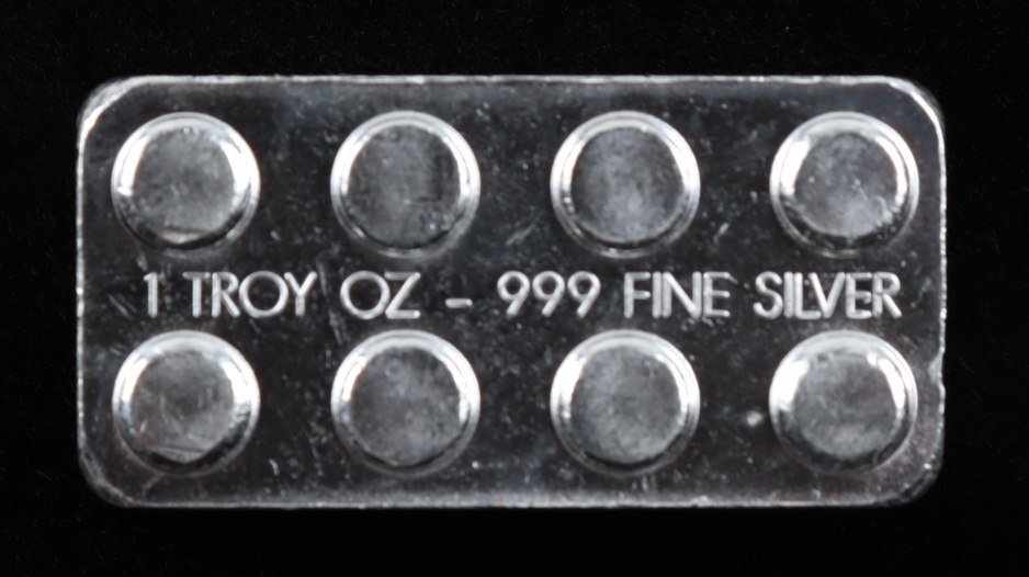 1 Troy oz .999 Fine Silver Lego Bullion Bar at PristineAuction.com 1 Troy oz .999 Fine Silver Lego Bullion Bar at PristineAuction.com