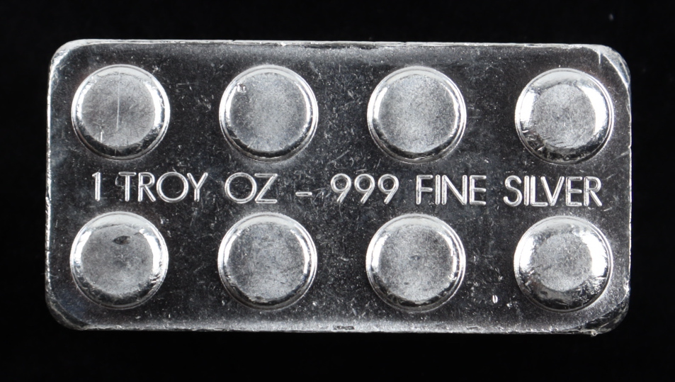 1 Troy oz .999 Fine Silver Lego Bullion Bar at PristineAuction.com 1 Troy oz .999 Fine Silver Lego Bullion Bar at PristineAuction.com