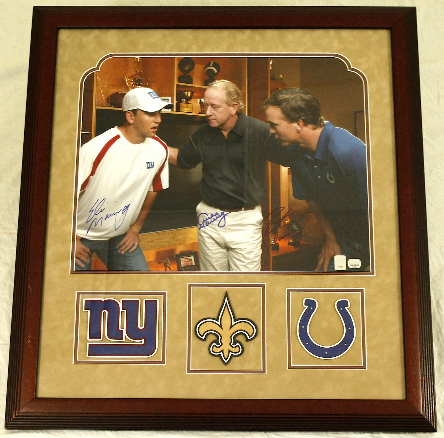 Peyton, Eli & Archie Manning Signed 27x30 Custom Framed Display (Mounted Memories COA) at PristineAuction.com Peyton, Eli & Archie Manning Signed 27x30 Custom Framed Display (Mounted Memories COA) at PristineAuction.com