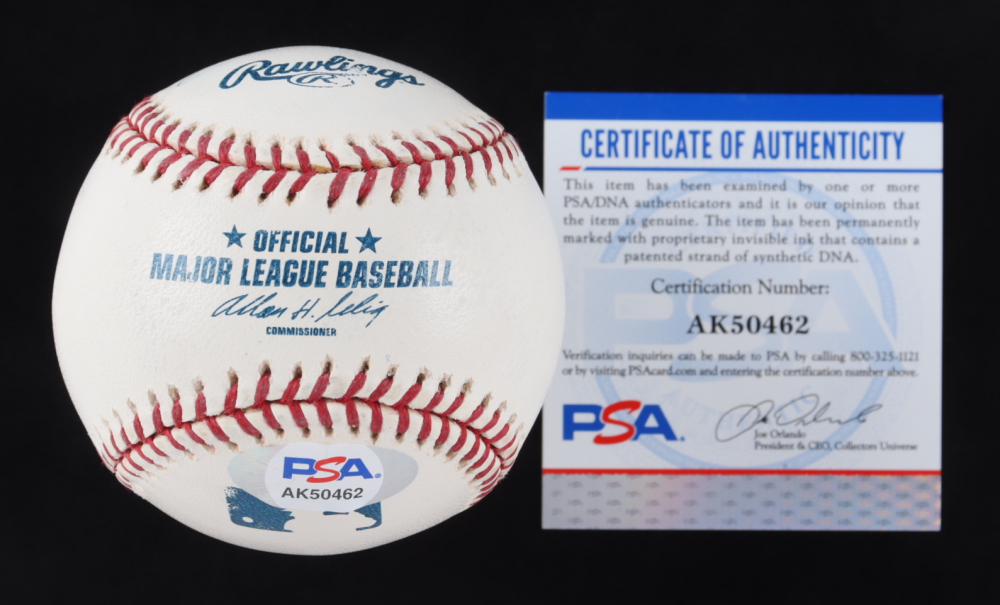 A close-up of Mike Piazza's signature on a PSA-certified baseball, highlighting the authenticity of the autograph.