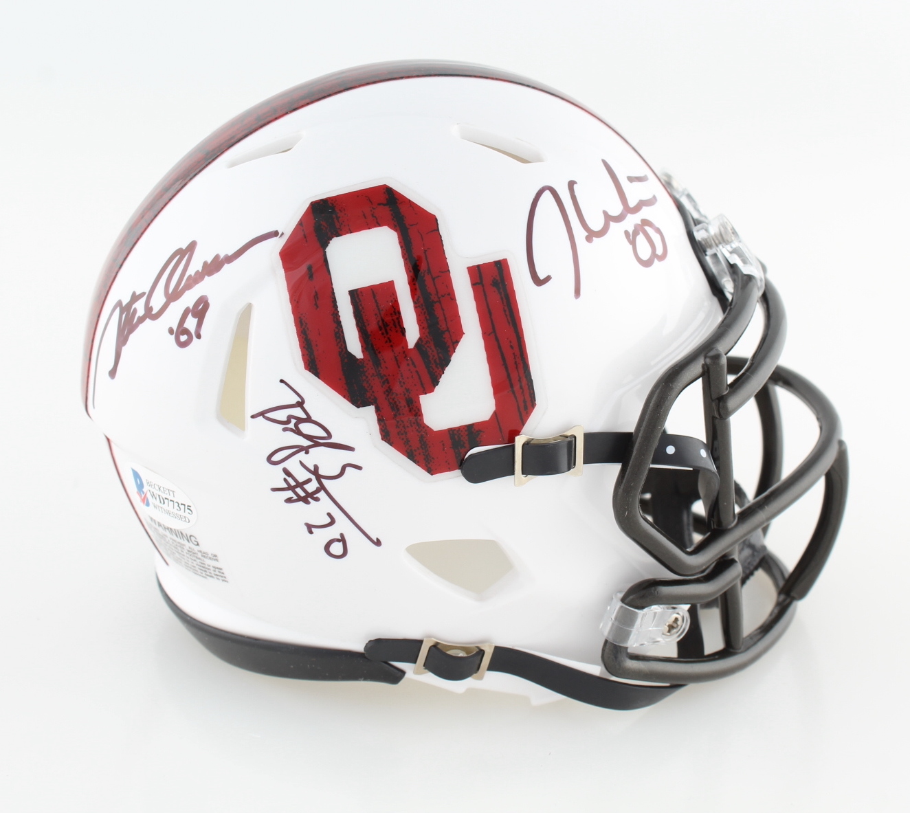 Billy Sims, Steve Owens & Jason White Signed Oklahoma Sooners Speed Mini Helmet with Heisman Inscriptions (Beckett) at PristineAuction.com Billy Sims, Steve Owens & Jason White Signed Oklahoma Sooners Speed Mini Helmet with Heisman Inscriptions (Beckett) at PristineAuction.com