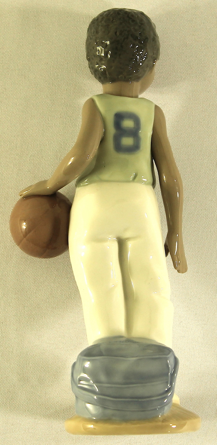 "Basketball Player" Nao by Lladro Figurine #1226 AA at PristineAuction.com "Basketball Player" Nao by Lladro Figurine #1226 AA at PristineAuction.com