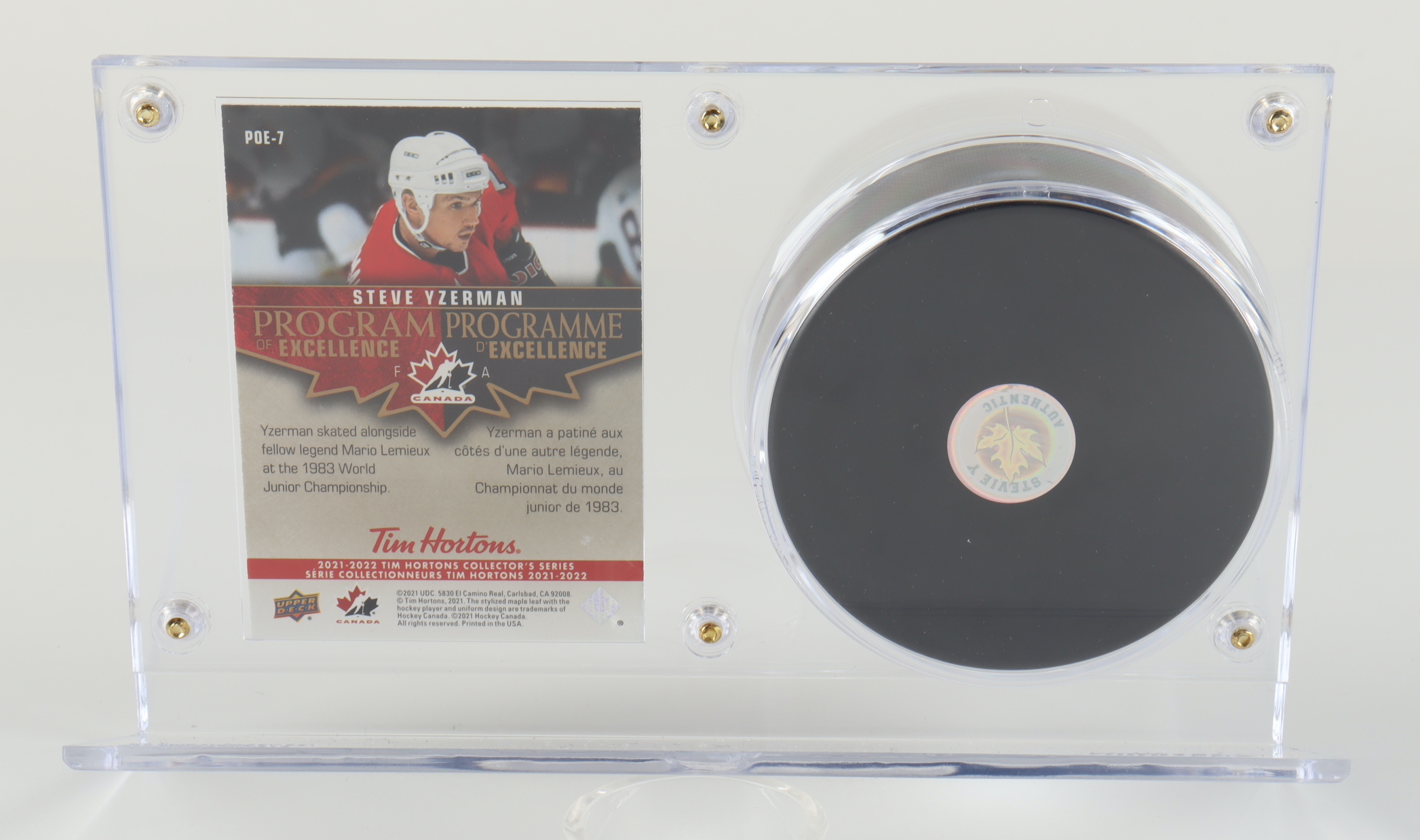 Steve Yzerman Signed Team Canada 5x8 Custom Hockey Puck Display with 2021-22 Upper Deck Tim Hortons Team Canada Program of Excellence Heroes #POE7 (Yzerman) at PristineAuction.com Steve Yzerman Signed Team Canada 5x8 Custom Hockey Puck Display with 2021-22 Upper Deck Tim Hortons Team Canada Program of Excellence Heroes #POE7 (Yzerman) at PristineAuction.com