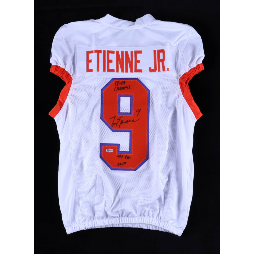 Travis Etienne Jr. Signed Jersey Inscribed "18-19 Champs" & "44-16 3TDS" (JSA) at PristineAuction.com
