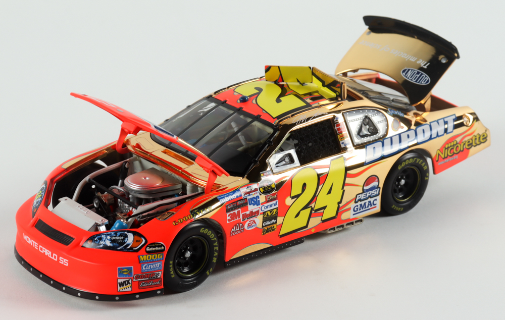 Jeff Gordon LE #24 DuPont 2006 Monte Carlo Gold 1:24 Scale Diecast Car at PristineAuction.com Jeff Gordon LE #24 DuPont 2006 Monte Carlo Gold 1:24 Scale Diecast Car at PristineAuction.com