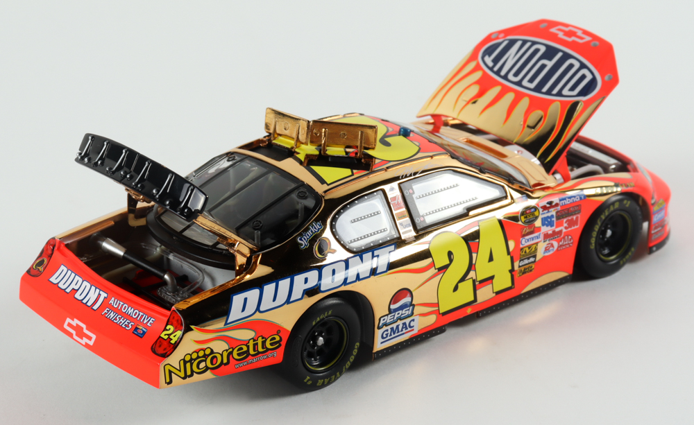 Jeff Gordon LE #24 DuPont 2006 Monte Carlo Gold 1:24 Scale Diecast Car at PristineAuction.com Jeff Gordon LE #24 DuPont 2006 Monte Carlo Gold 1:24 Scale Diecast Car at PristineAuction.com