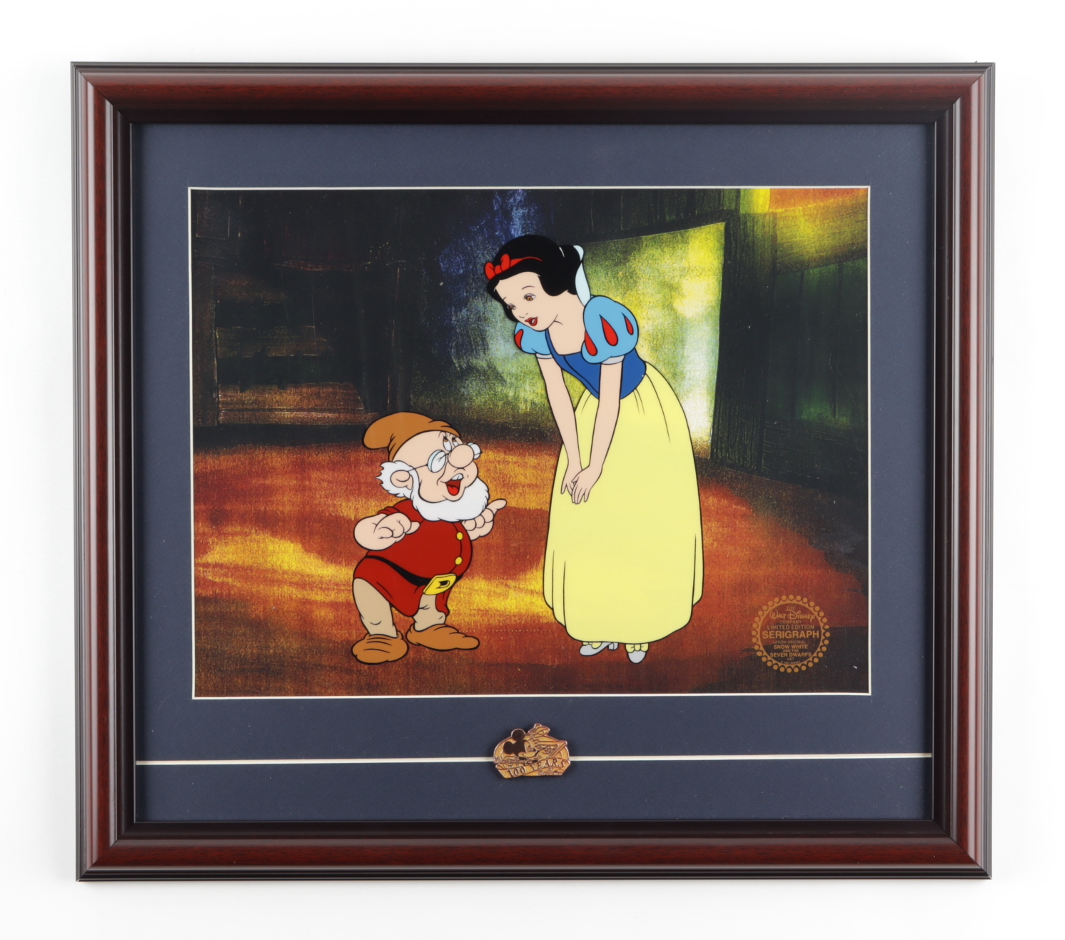 Walt Disney's "Snow White and the Seven Dwarfs" 16x18 Custom Framed (2) Piece Animation Cel with 100 Years Disney Animation Brass Pin at PristineAuction.com Walt Disney's "Snow White and the Seven Dwarfs" 16x18 Custom Framed (2) Piece Animation Cel with 100 Years Disney Animation Brass Pin at PristineAuction.com
