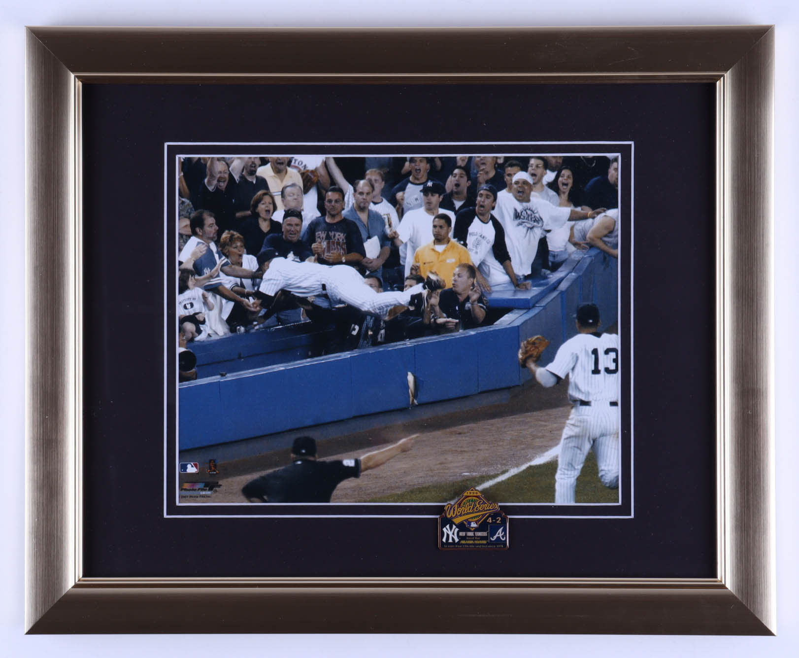 Derek Jeter "The Dive" 13x16 Custom Framed Print Display with 1996 World Series Pin at PristineAuction.com Derek Jeter "The Dive" 13x16 Custom Framed Print Display with 1996 World Series Pin at PristineAuction.com