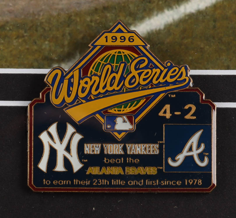 Derek Jeter "The Dive" 13x16 Custom Framed Print Display with 1996 World Series Pin at PristineAuction.com Derek Jeter "The Dive" 13x16 Custom Framed Print Display with 1996 World Series Pin at PristineAuction.com