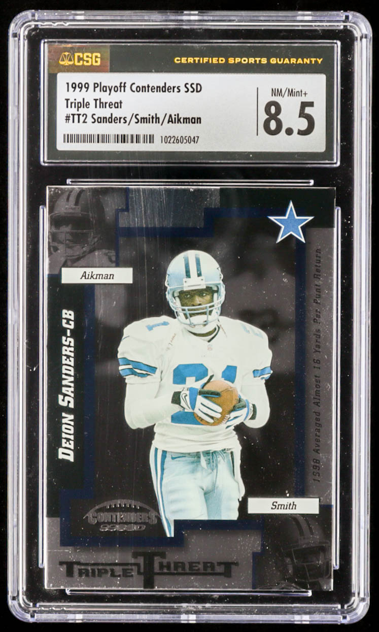 Deion Sanders / Troy Aikman / Emmitt Smith 1999 Playoff Contenders SSD Triple Threat #TT2 (CSG 8.5) at PristineAuction.com Deion Sanders / Troy Aikman / Emmitt Smith 1999 Playoff Contenders SSD Triple Threat #TT2 (CSG 8.5) at PristineAuction.com