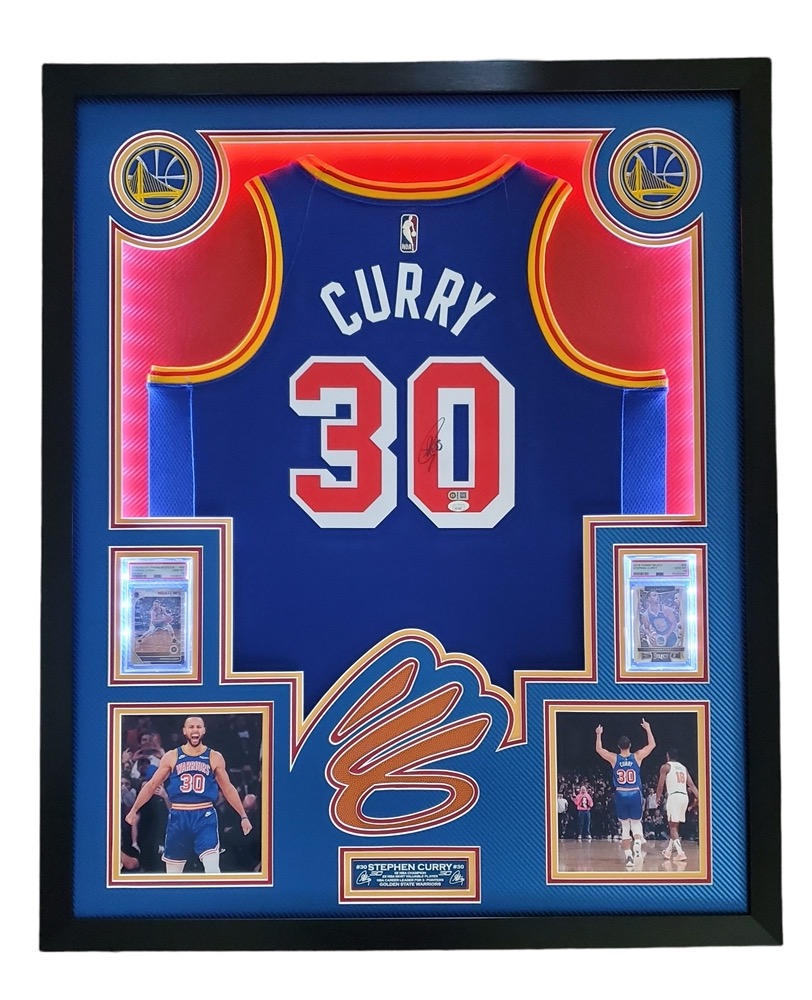 Steph Curry Signed 33x42 Custom Framed LED-Backlit Jersey Display with 2016-17 Select #88 (PSA 10) & 2019-20 Hoops Premium Stock Prizms Pulsar #59 (PSA 10) (JSA & Curry) at PristineAuction.com Steph Curry Signed 33x42 Custom Framed LED-Backlit Jersey Display with 2016-17 Select #88 (PSA 10) & 2019-20 Hoops Premium Stock Prizms Pulsar #59 (PSA 10) (JSA & Curry) at PristineAuction.com