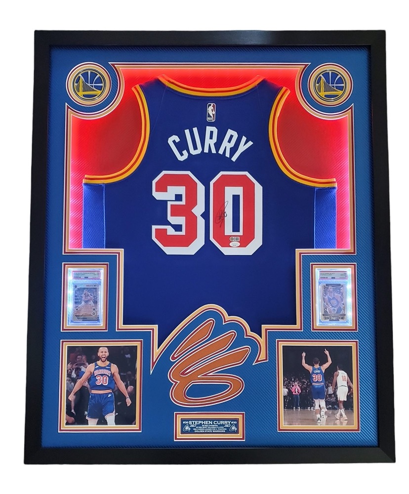 Steph Curry Signed 33x42 Custom Framed LED-Backlit Jersey Display with 2016-17 Select #88 (PSA 10) & 2019-20 Hoops Premium Stock Prizms Pulsar #59 (PSA 10) (JSA & Curry) at PristineAuction.com Steph Curry Signed 33x42 Custom Framed LED-Backlit Jersey Display with 2016-17 Select #88 (PSA 10) & 2019-20 Hoops Premium Stock Prizms Pulsar #59 (PSA 10) (JSA & Curry) at PristineAuction.com