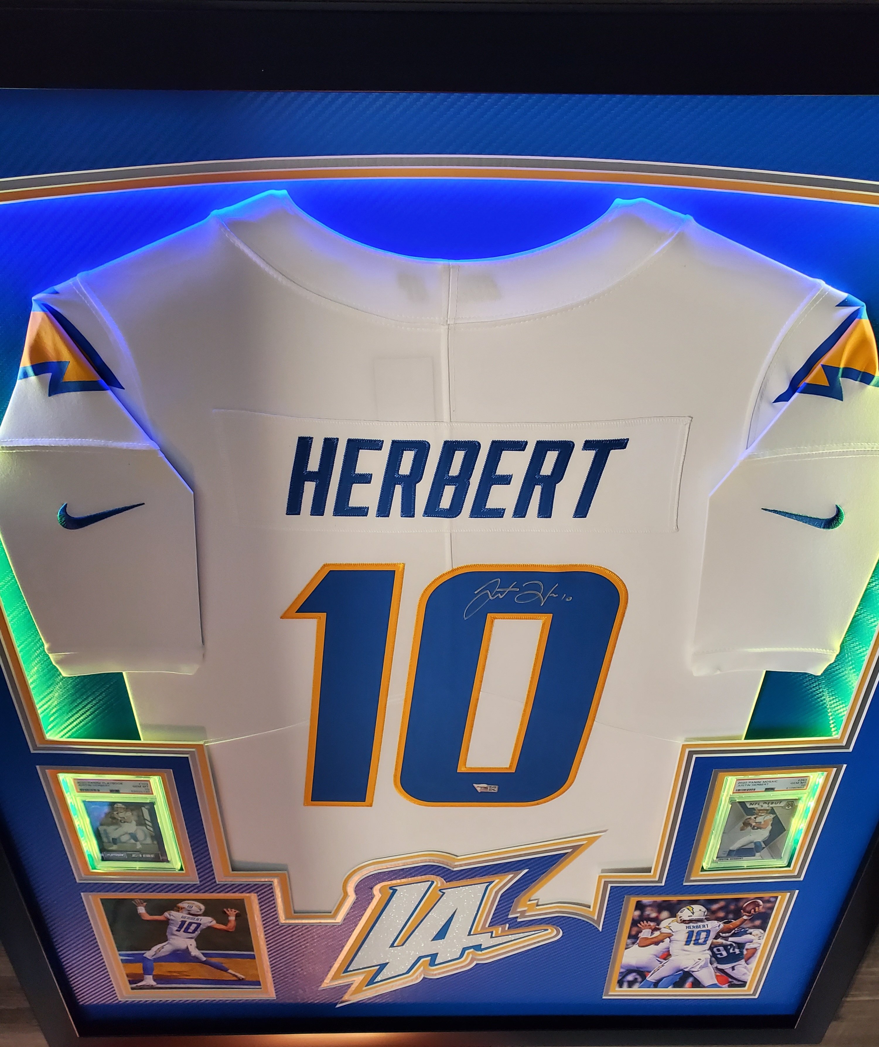 Justin Herbert Signed Chargers 33x42 Custom Framed LED-Backlit Jersey Display with 2020 Panini Playbook #103 RC & 2020 Panini Mosaic #263 DEB (Panini & PSA 10) at PristineAuction.com Justin Herbert Signed Chargers 33x42 Custom Framed LED-Backlit Jersey Display with 2020 Panini Playbook #103 RC & 2020 Panini Mosaic #263 DEB (Panini & PSA 10) at PristineAuction.com
