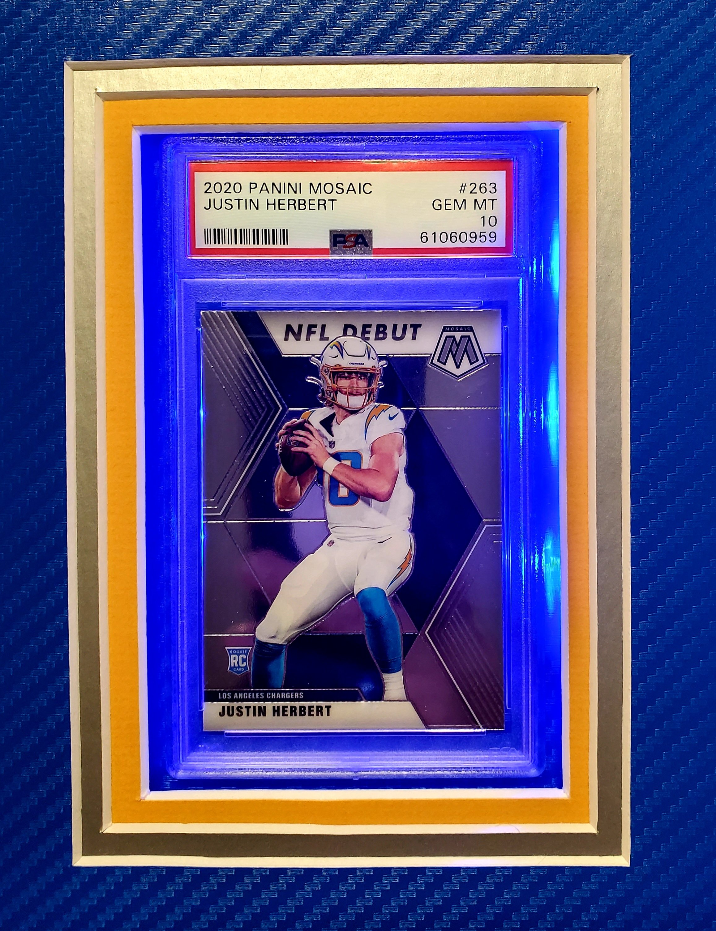 Justin Herbert Signed Chargers 33x42 Custom Framed LED-Backlit Jersey Display with 2020 Panini Playbook #103 RC & 2020 Panini Mosaic #263 DEB (Panini & PSA 10) at PristineAuction.com Justin Herbert Signed Chargers 33x42 Custom Framed LED-Backlit Jersey Display with 2020 Panini Playbook #103 RC & 2020 Panini Mosaic #263 DEB (Panini & PSA 10) at PristineAuction.com