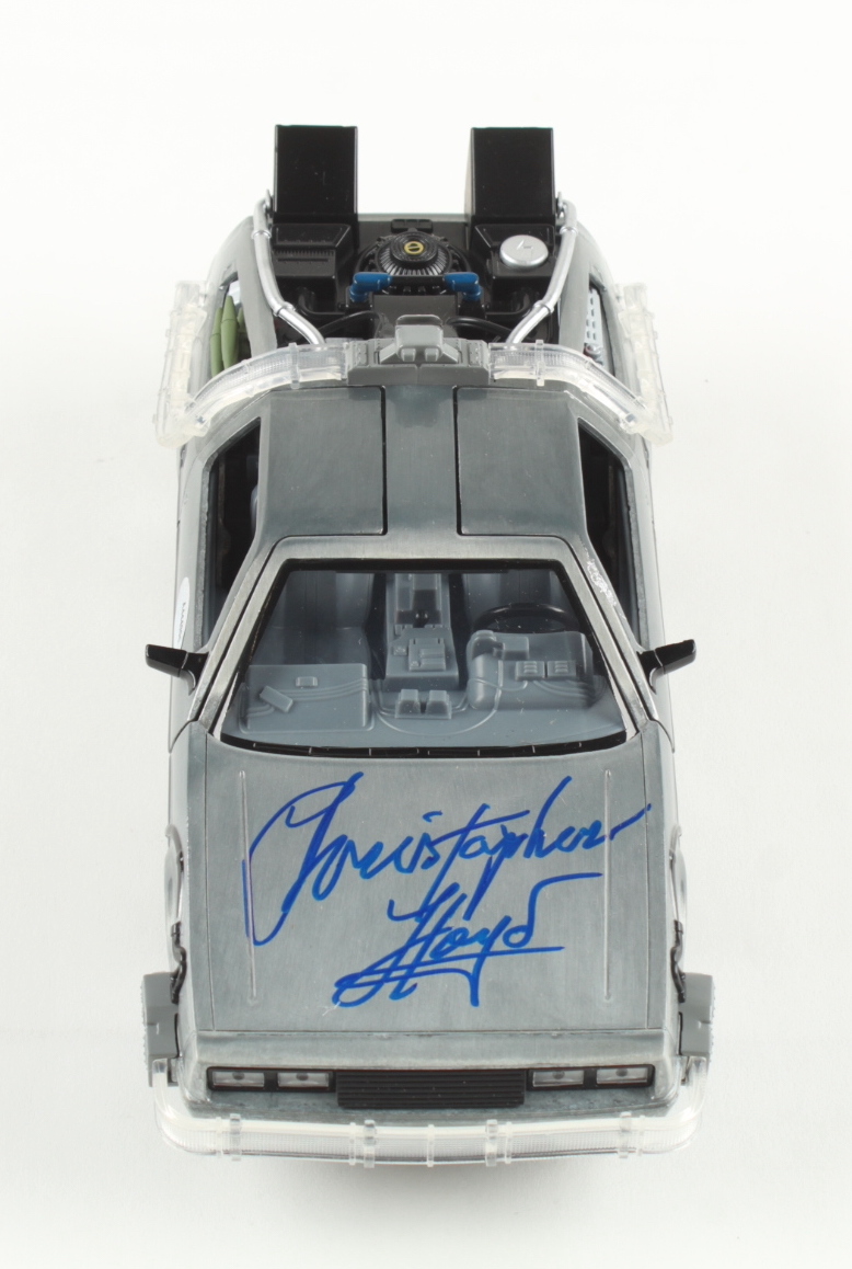Christopher Lloyd Signed "Back to the Future" DeLorean Time Machine 1:24 Scale Die-Cast Car (Schwartz) at PristineAuction.com Christopher Lloyd Signed "Back to the Future" DeLorean Time Machine 1:24 Scale Die-Cast Car (Schwartz) at PristineAuction.com
