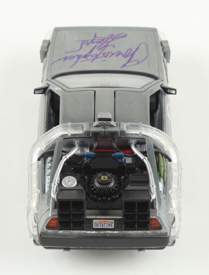 Christopher Lloyd Signed "Back to the Future" DeLorean Time Machine 1:24 Scale Die-Cast Car (Schwartz) at PristineAuction.com Christopher Lloyd Signed "Back to the Future" DeLorean Time Machine 1:24 Scale Die-Cast Car (Schwartz) at PristineAuction.com