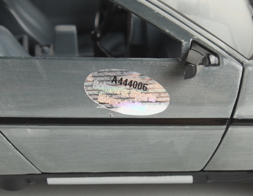 Christopher Lloyd Signed "Back to the Future" DeLorean Time Machine 1:24 Scale Die-Cast Car (Schwartz) at PristineAuction.com Christopher Lloyd Signed "Back to the Future" DeLorean Time Machine 1:24 Scale Die-Cast Car (Schwartz) at PristineAuction.com