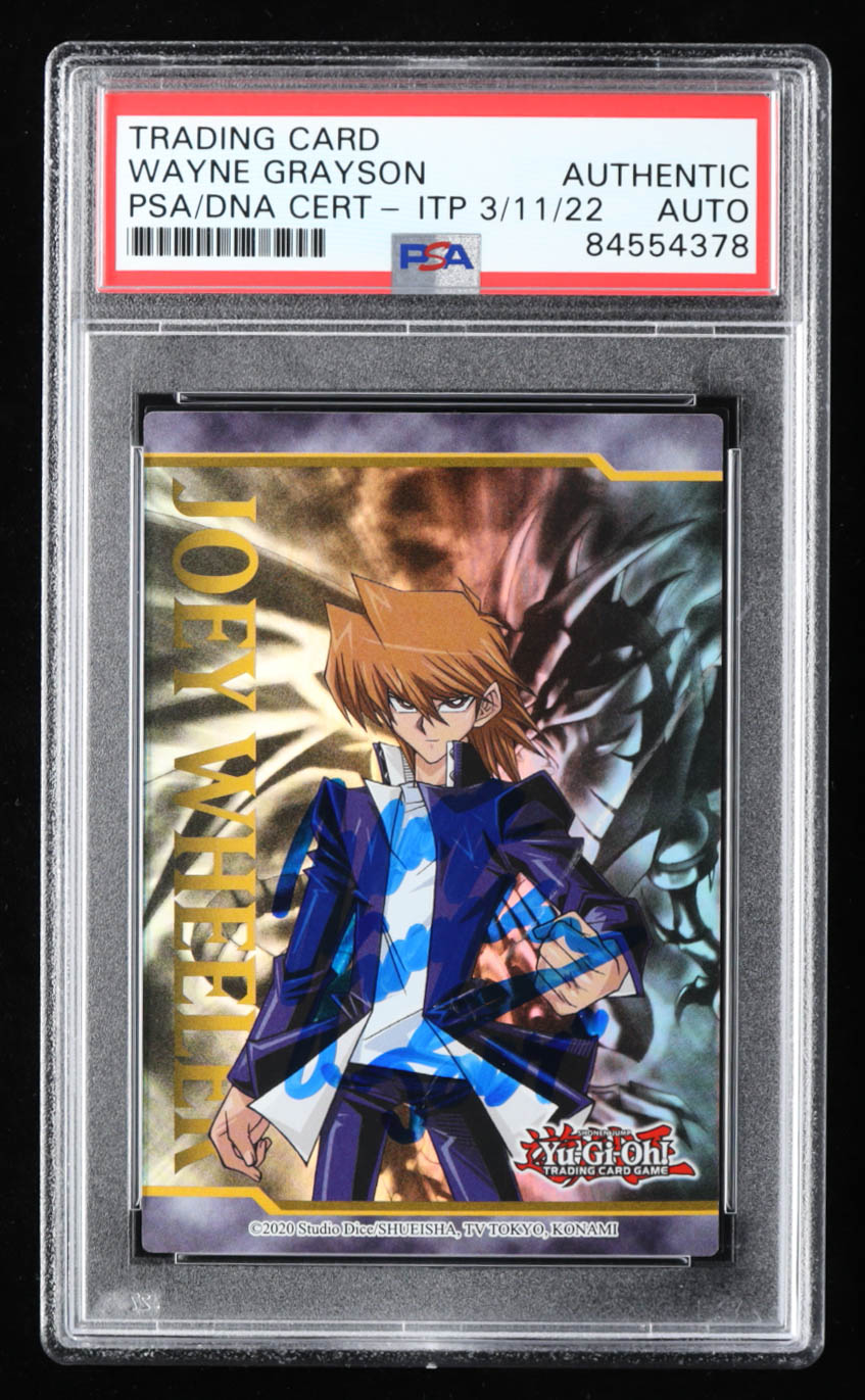 Wayne Grayson Signed Joey Wheeler YuGiOh Legendary Duelists: Season 1 Art Token Inscribed "Joey" (PSA) at PristineAuction.com Wayne Grayson Signed Joey Wheeler YuGiOh Legendary Duelists: Season 1 Art Token Inscribed "Joey" (PSA) at PristineAuction.com