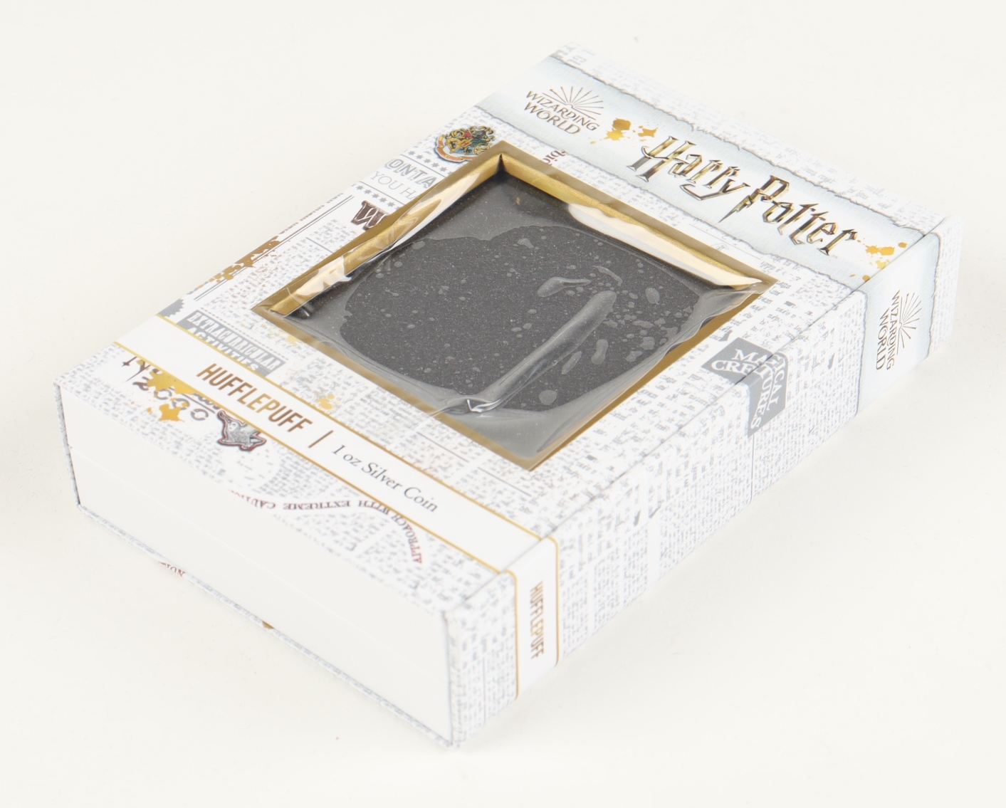 2021 Niue Silver Harry Potter Hogwarts House Banner - Hufflepuff Crest 1 oz .999 Fine Silver Coin with Original Packaging at PristineAuction.com 2021 Niue Silver Harry Potter Hogwarts House Banner - Hufflepuff Crest 1 oz .999 Fine Silver Coin with Original Packaging at PristineAuction.com