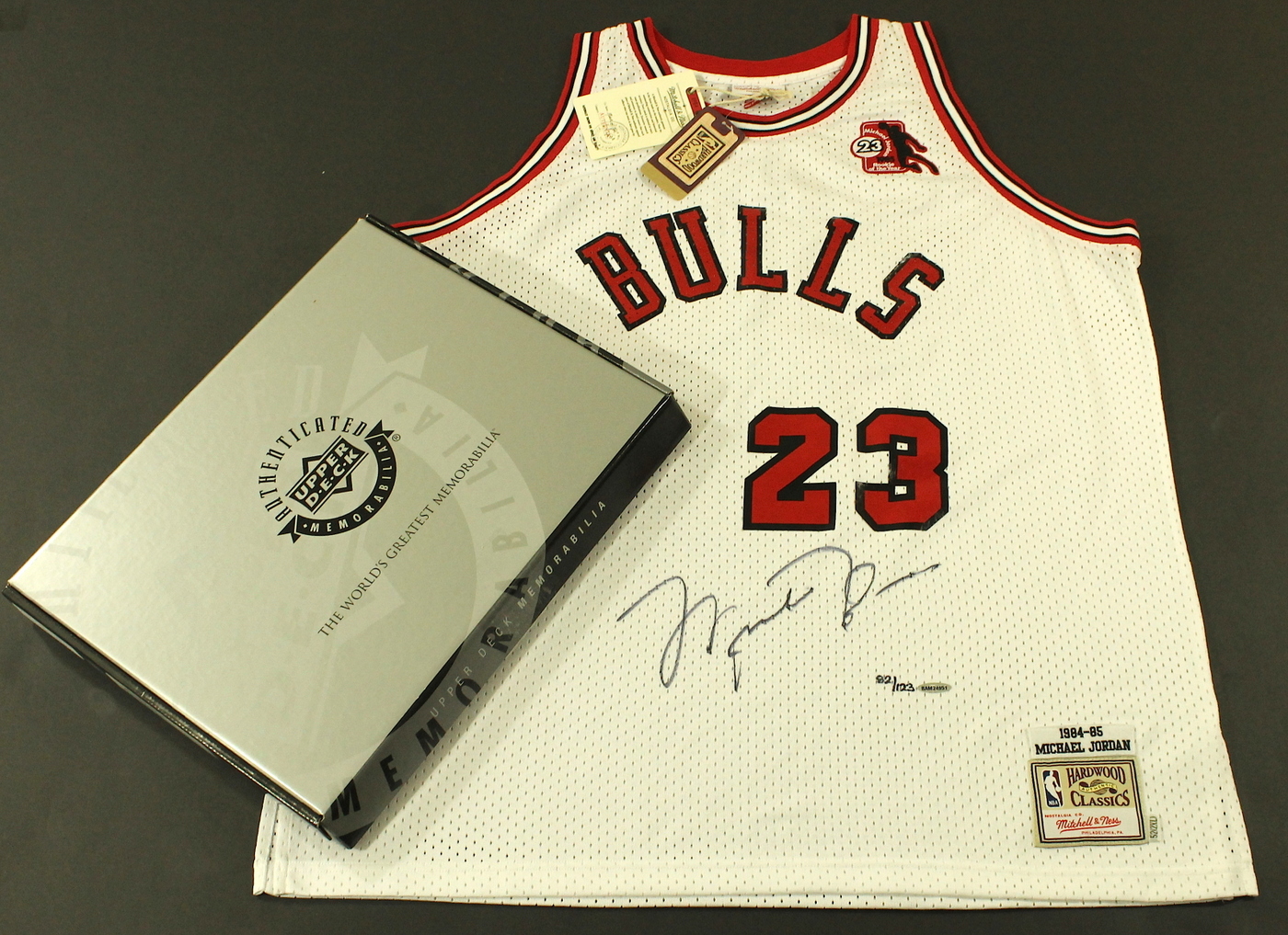 Michael Jordan Signed Limited Edition Authentic Mitchell & Ness 1984-85 "Rookie of the Year" Bulls Jersey #82/123 (UDA COA) at PristineAuction.com Michael Jordan Signed Limited Edition Authentic Mitchell & Ness 1984-85 "Rookie of the Year" Bulls Jersey #82/123 (UDA COA) at PristineAuction.com
