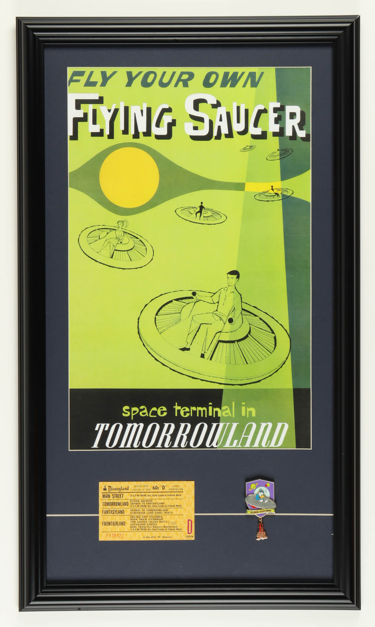 Disneyland Flying Saucer Tomorrowland 15x26 Custom Framed Print Display with Vintage "D" Flying Saucers Ticket & Official Pin at PristineAuction.com Disneyland Flying Saucer Tomorrowland 15x26 Custom Framed Print Display with Vintage "D" Flying Saucers Ticket & Official Pin at PristineAuction.com