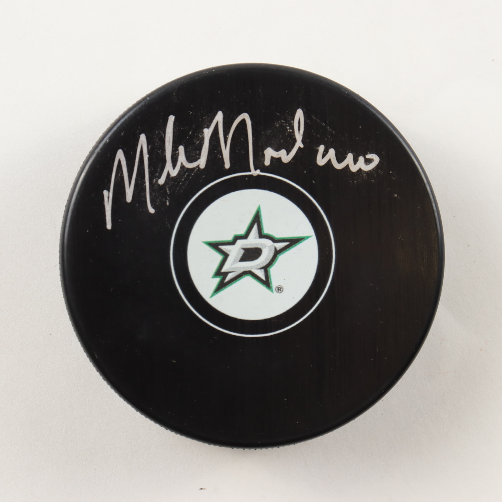 Mike Modano Signed Stars Logo Hockey Puck (Players Ink) at PristineAuction.com Mike Modano Signed Stars Logo Hockey Puck (Players Ink) at PristineAuction.com