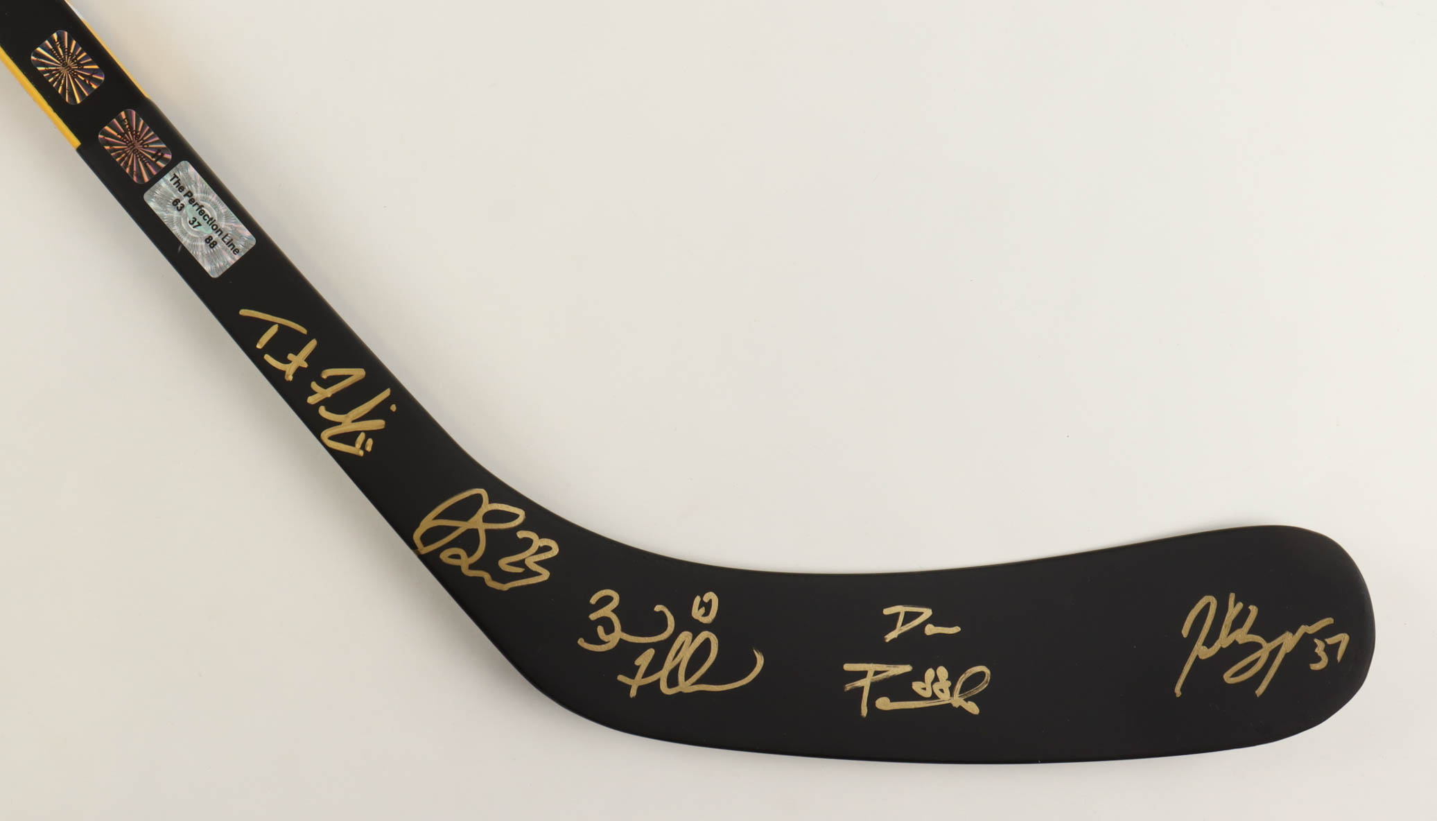 Bruins Logo Hockey Stick Signed by (5) with Brad Marchand, Patrice Bergeron, David Pastrnak, Trent Frederic & Jack Studnicka (YSMS) at PristineAuction.com Bruins Logo Hockey Stick Signed by (5) with Brad Marchand, Patrice Bergeron, David Pastrnak, Trent Frederic & Jack Studnicka (YSMS) at PristineAuction.com