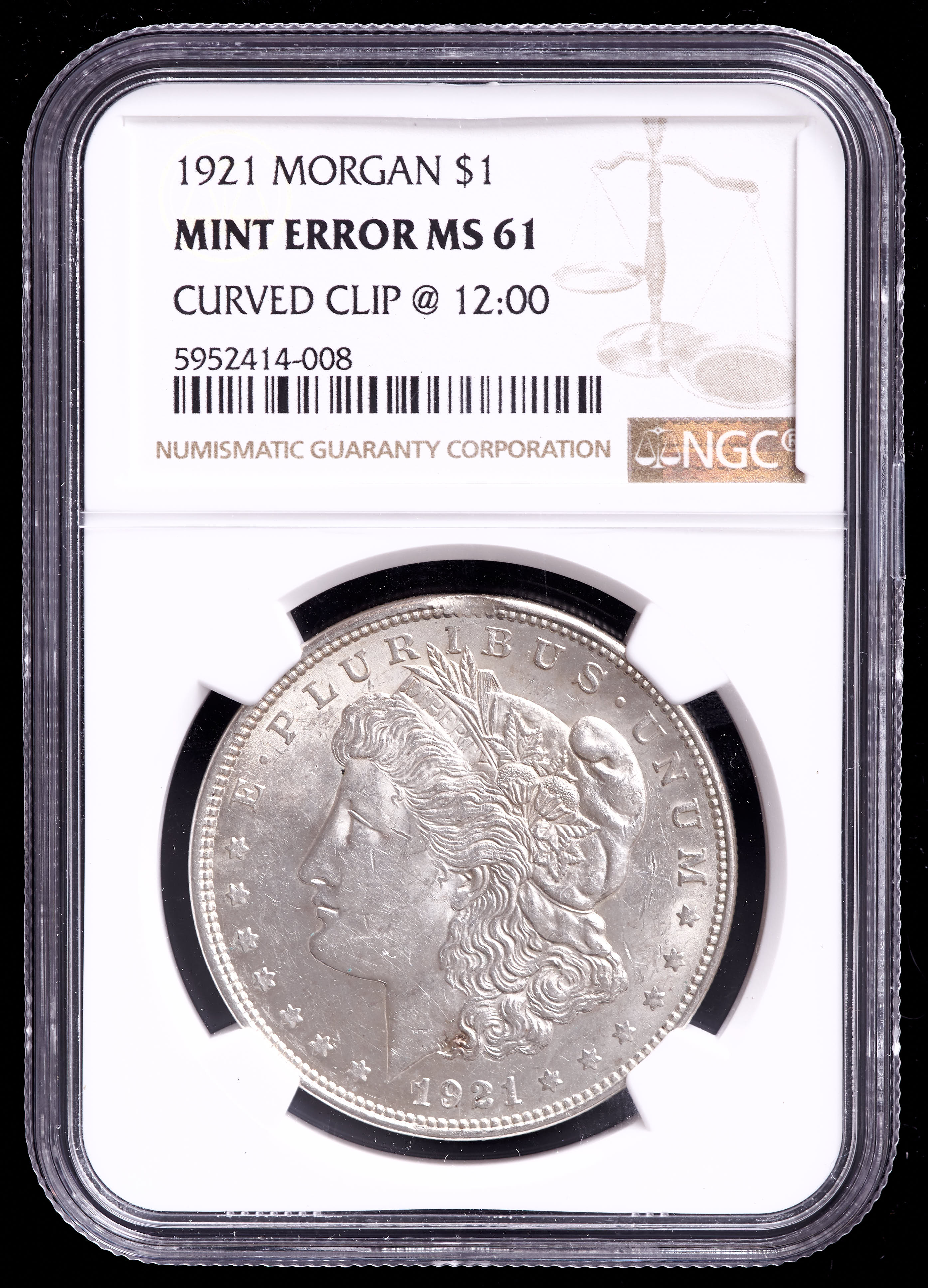 1921 Morgan Silver Dollar Mint Error - Curved Clip @ 12:00 (NGC MS61) at PristineAuction.com 1921 Morgan Silver Dollar Mint Error - Curved Clip @ 12:00 (NGC MS61) at PristineAuction.com