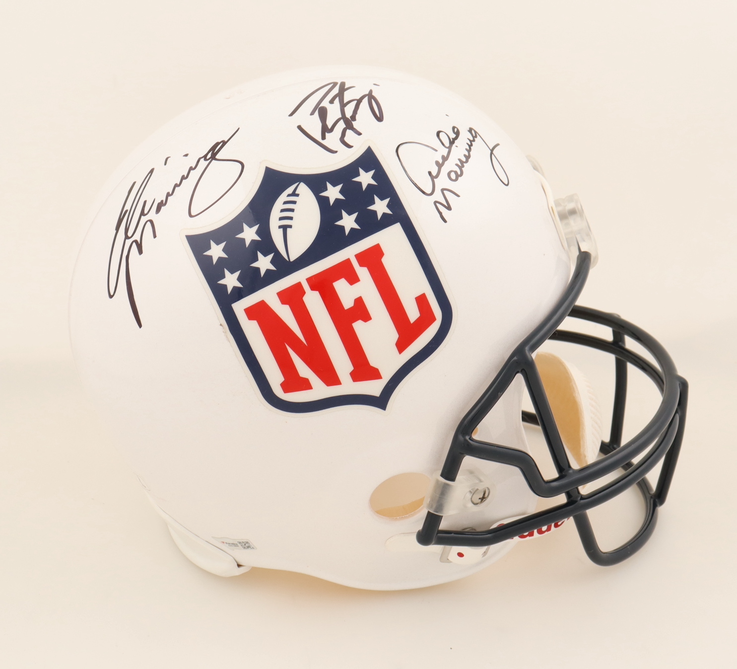 Archie Manning, Peyton Manning & Eli Manning Signed NFL Logo Full-Size Helmet (Fanatics) at PristineAuction.com Archie Manning, Peyton Manning & Eli Manning Signed NFL Logo Full-Size Helmet (Fanatics) at PristineAuction.com
