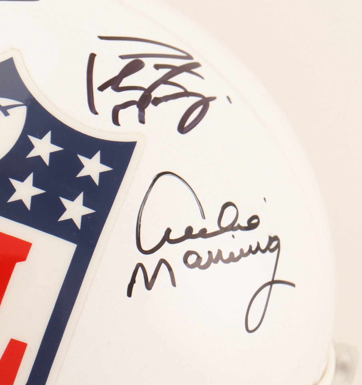 Archie Manning, Peyton Manning & Eli Manning Signed NFL Logo Full-Size Helmet (Fanatics) at PristineAuction.com Archie Manning, Peyton Manning & Eli Manning Signed NFL Logo Full-Size Helmet (Fanatics) at PristineAuction.com