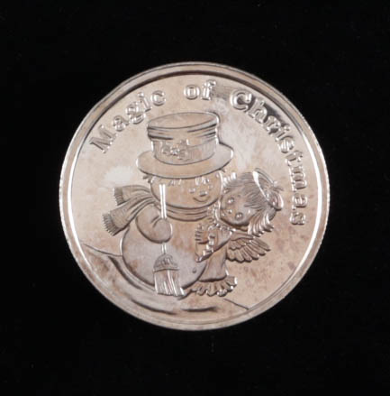 1 Troy Ounce .999 Fine Silver 2004 "Magic of Christmas Snowman" Bullion Round at PristineAuction.com 1 Troy Ounce .999 Fine Silver 2004 "Magic of Christmas Snowman" Bullion Round at PristineAuction.com