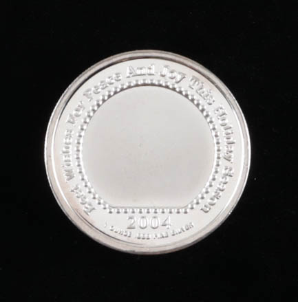 1 Troy Ounce .999 Fine Silver 2004 "Magic of Christmas Snowman" Bullion Round at PristineAuction.com 1 Troy Ounce .999 Fine Silver 2004 "Magic of Christmas Snowman" Bullion Round at PristineAuction.com