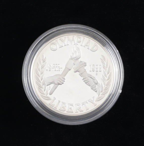 1988-S $1 One Dollar Olympiad Liberty Commemorative Silver Bullion Round at PristineAuction.com 1988-S $1 One Dollar Olympiad Liberty Commemorative Silver Bullion Round at PristineAuction.com