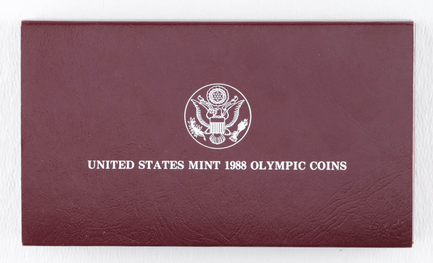 1988-S $1 One Dollar Olympiad Liberty Commemorative Silver Bullion Round at PristineAuction.com 1988-S $1 One Dollar Olympiad Liberty Commemorative Silver Bullion Round at PristineAuction.com