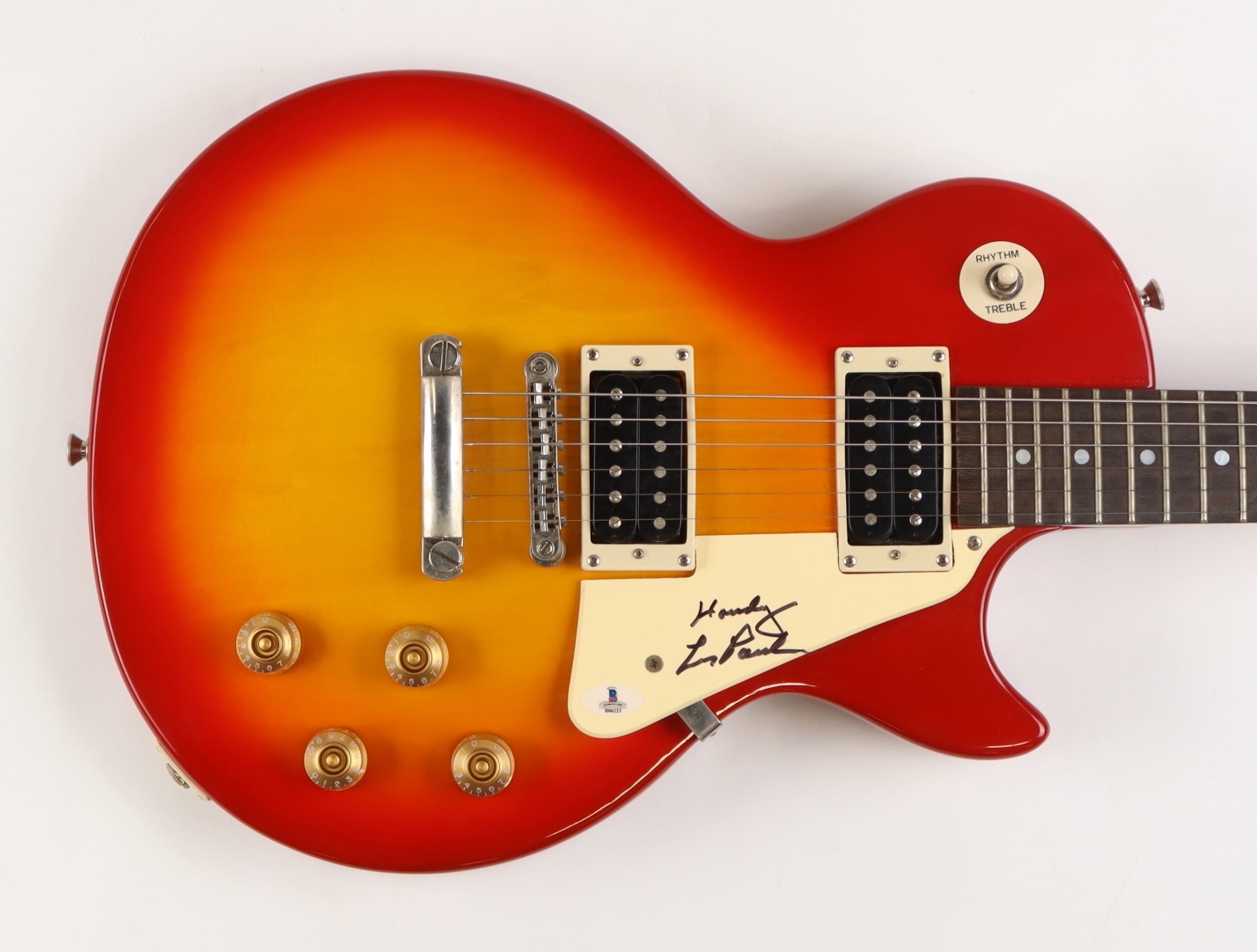 Les Paul Signed Epiphone Les Paul 100 Sunburst 39" Electric Guitar Inscribed "Howdy" (Beckett) at PristineAuction.com Les Paul Signed Epiphone Les Paul 100 Sunburst 39" Electric Guitar Inscribed "Howdy" (Beckett) at PristineAuction.com