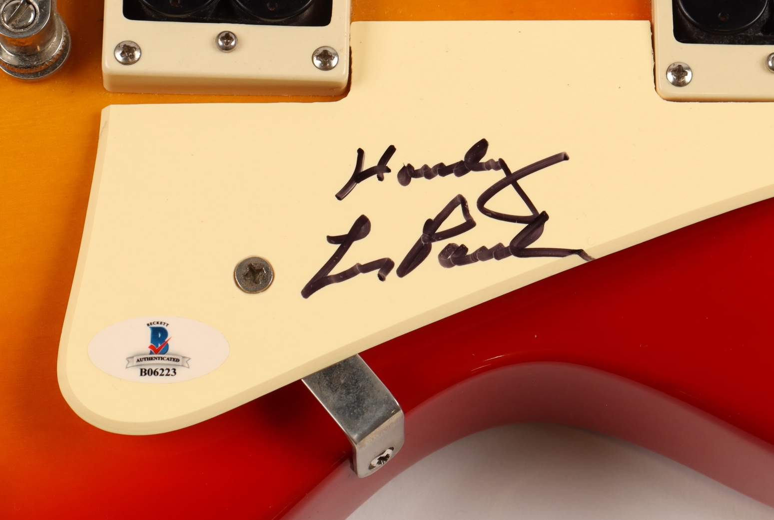Les Paul Signed Epiphone Les Paul 100 Sunburst 39" Electric Guitar Inscribed "Howdy" (Beckett) at PristineAuction.com Les Paul Signed Epiphone Les Paul 100 Sunburst 39" Electric Guitar Inscribed "Howdy" (Beckett) at PristineAuction.com