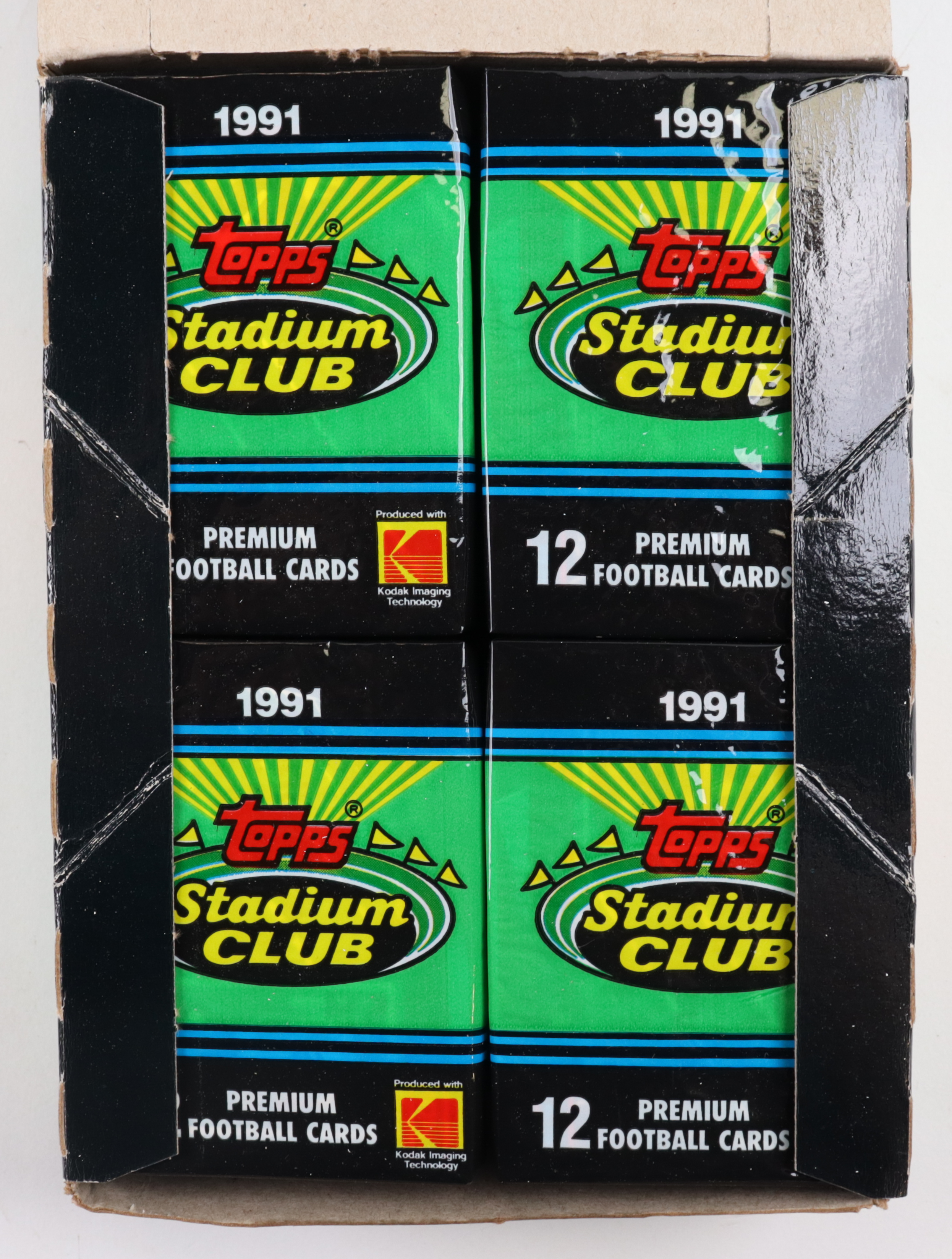 1991 Topps Stadium Club Football Wax Box with (36) Packs at PristineAuction.com 1991 Topps Stadium Club Football Wax Box with (36) Packs at PristineAuction.com