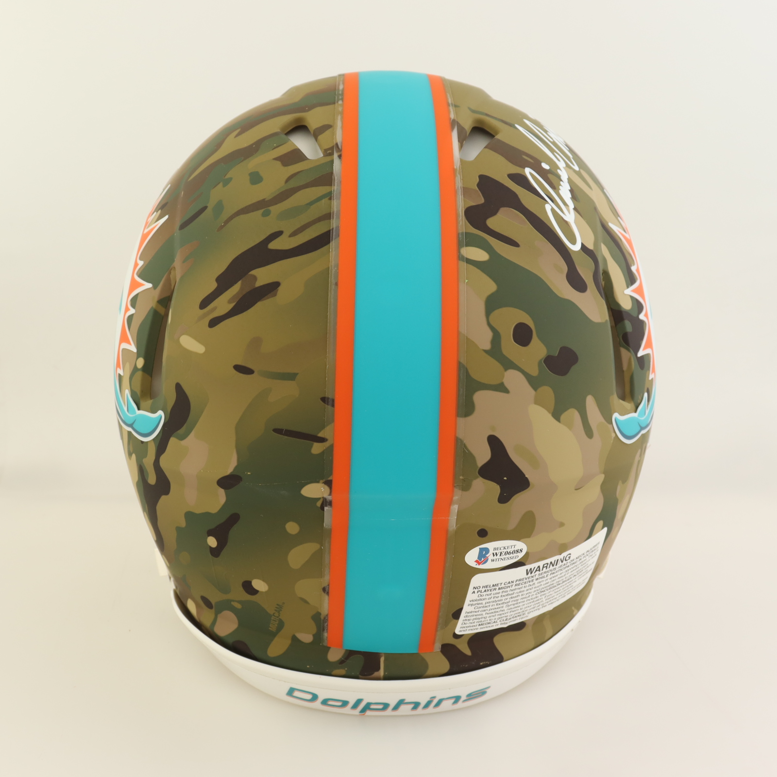 Dan Marino Signed Dolphins Full-Size Authentic On-Field Camo Alternate Speed Helmet (Beckett) at PristineAuction.com Dan Marino Signed Dolphins Full-Size Authentic On-Field Camo Alternate Speed Helmet (Beckett) at PristineAuction.com