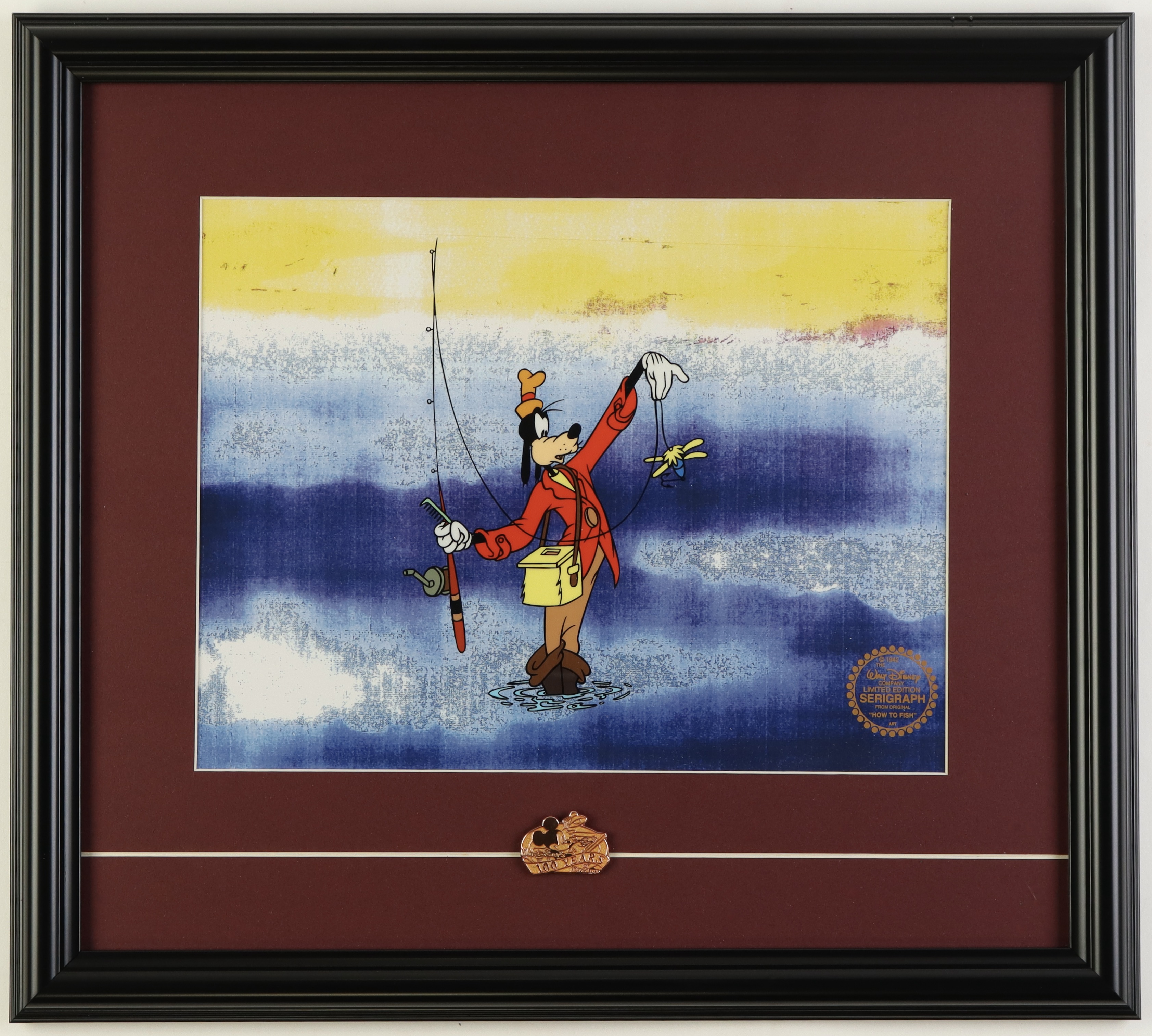 Disney "How to Fish" LE Custom Framed Animation Serigraph Cel with Official Disney seal and a Disney 100 Years Bronze Pin at PristineAuction.com Disney "How to Fish" LE Custom Framed Animation Serigraph Cel with Official Disney seal and a Disney 100 Years Bronze Pin at PristineAuction.com