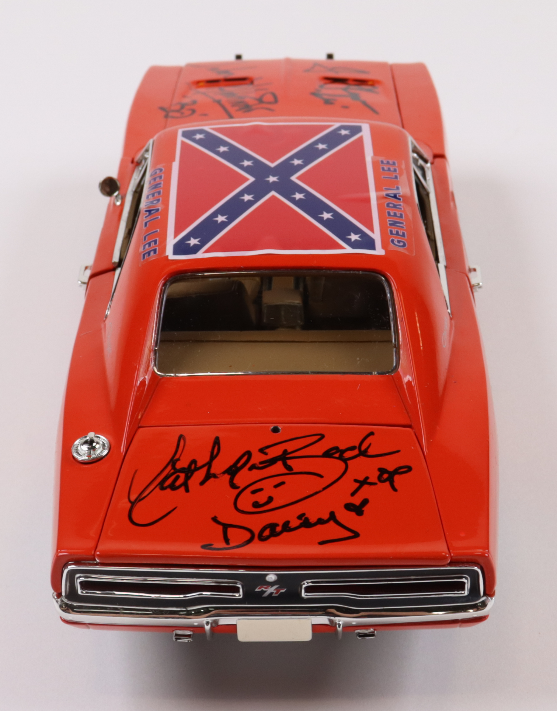 Catherine Bach, Tom Wopat & John Schneider Signed "The Dukes Of Hazzard" General Lee #01 1969 Dodge Charger 1:18 Premium Diecast Car with Multiple Inscriptions (JSA) at PristineAuction.com Catherine Bach, Tom Wopat & John Schneider Signed "The Dukes Of Hazzard" General Lee #01 1969 Dodge Charger 1:18 Premium Diecast Car with Multiple Inscriptions (JSA) at PristineAuction.com
