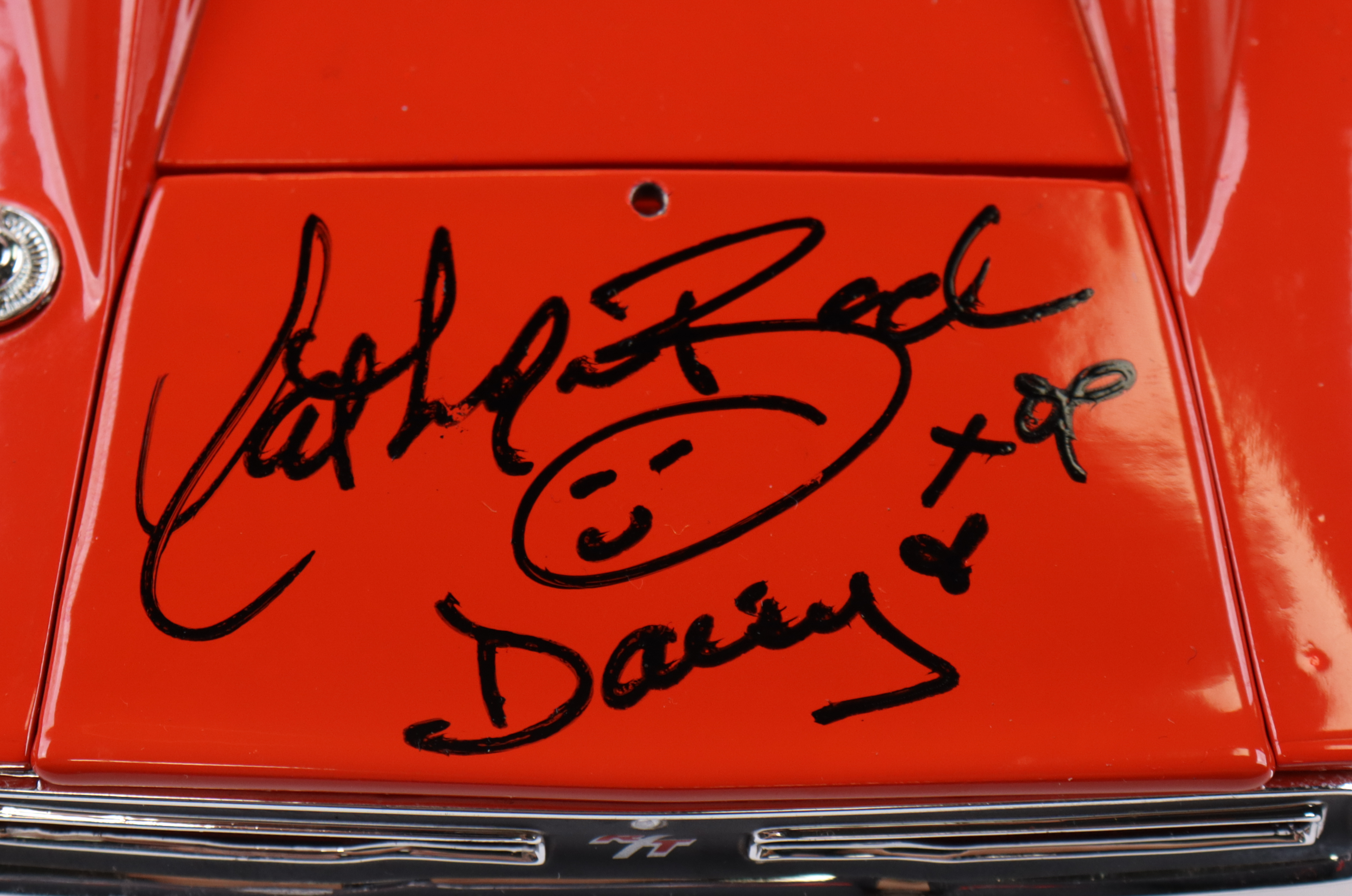 Catherine Bach, Tom Wopat & John Schneider Signed "The Dukes Of Hazzard" General Lee #01 1969 Dodge Charger 1:18 Premium Diecast Car with Multiple Inscriptions (JSA) at PristineAuction.com Catherine Bach, Tom Wopat & John Schneider Signed "The Dukes Of Hazzard" General Lee #01 1969 Dodge Charger 1:18 Premium Diecast Car with Multiple Inscriptions (JSA) at PristineAuction.com