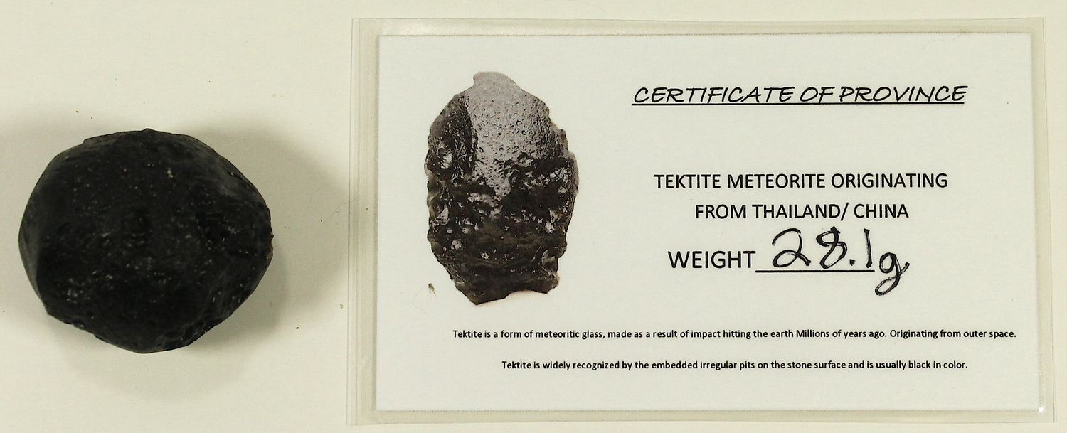 Tektite Meteorite from Thailand/China (28.1 grams) at PristineAuction.com Tektite Meteorite from Thailand/China (28.1 grams) at PristineAuction.com
