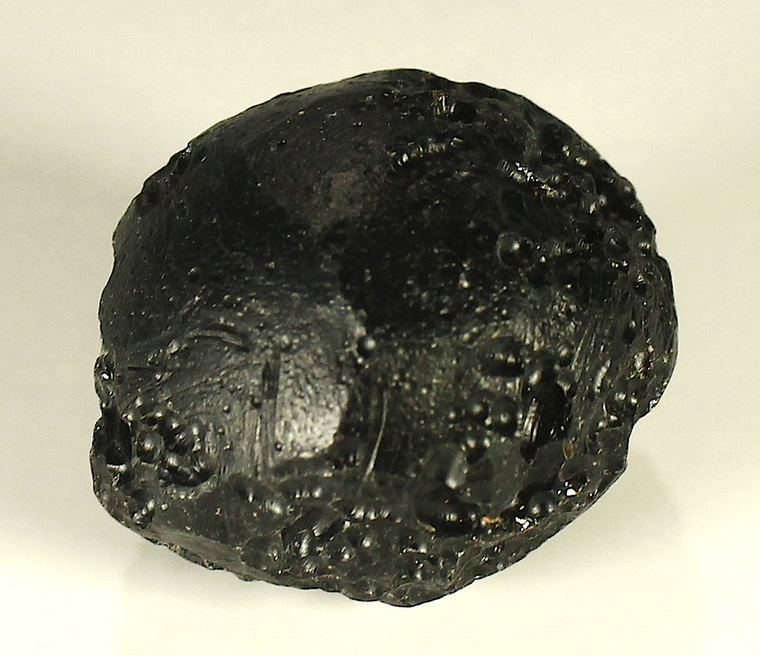 Tektite Meteorite from Thailand/China (25.4 grams) at PristineAuction.com Tektite Meteorite from Thailand/China (25.4 grams) at PristineAuction.com